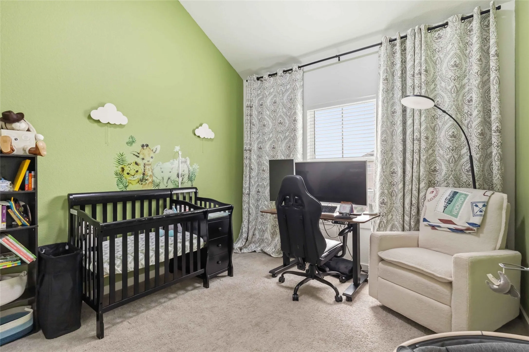 Carpeted bedroom and lofted ceiling