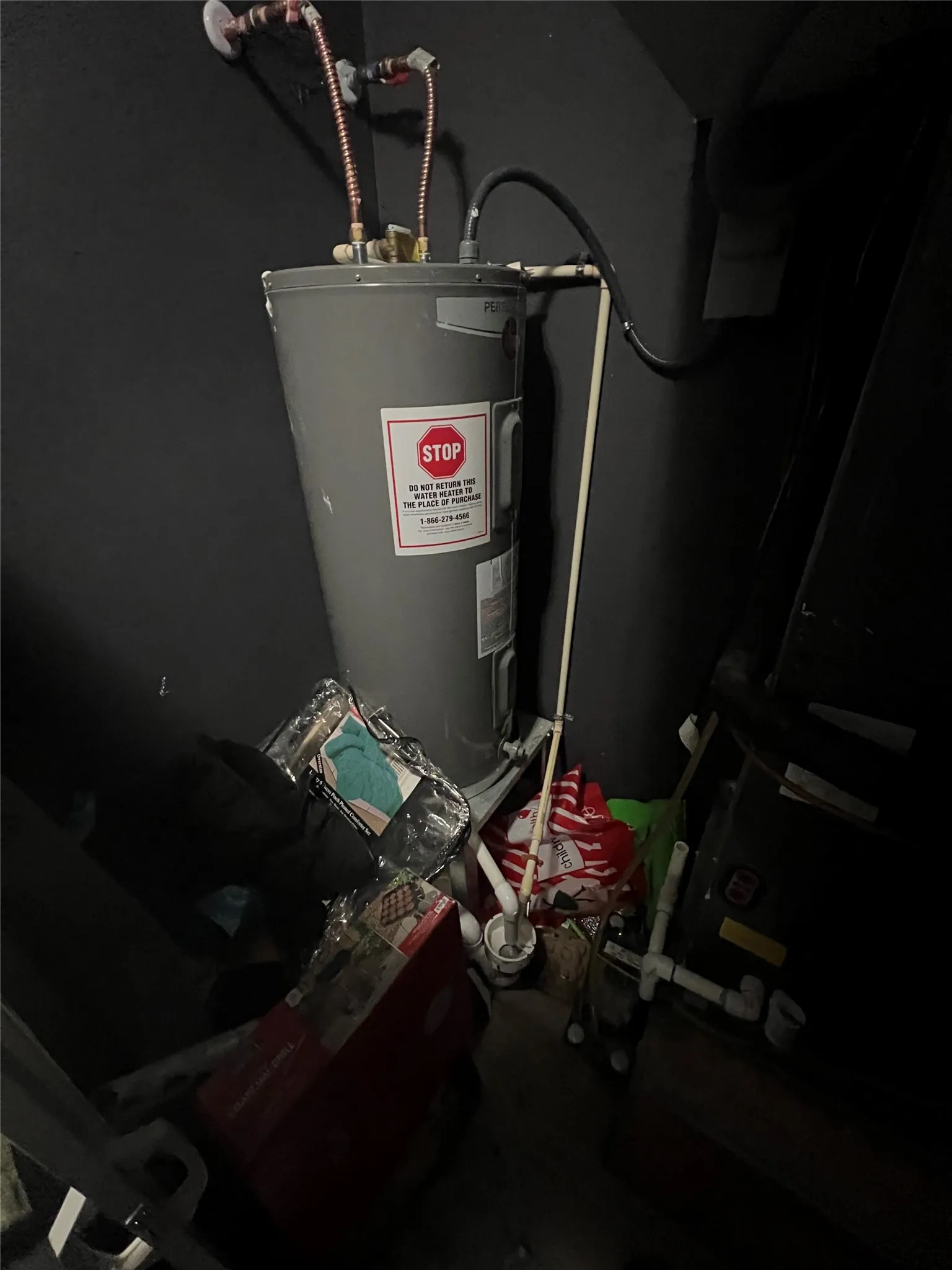 Utility room with electric water heater