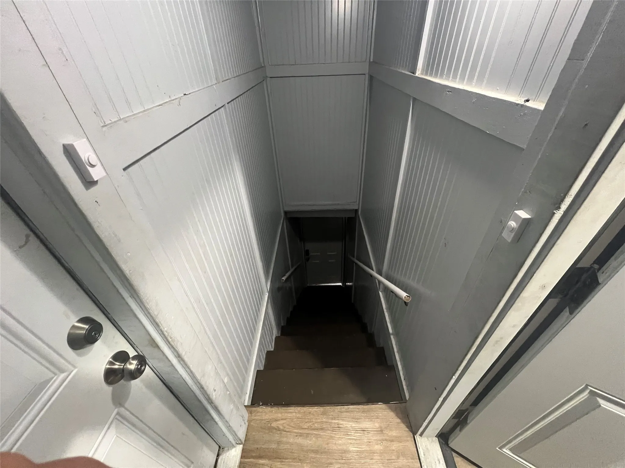 Stairs with metal wall