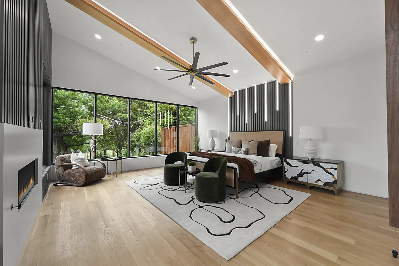 Second-floor mini primary suite - beamed vaulted ceilings add volume and warmth