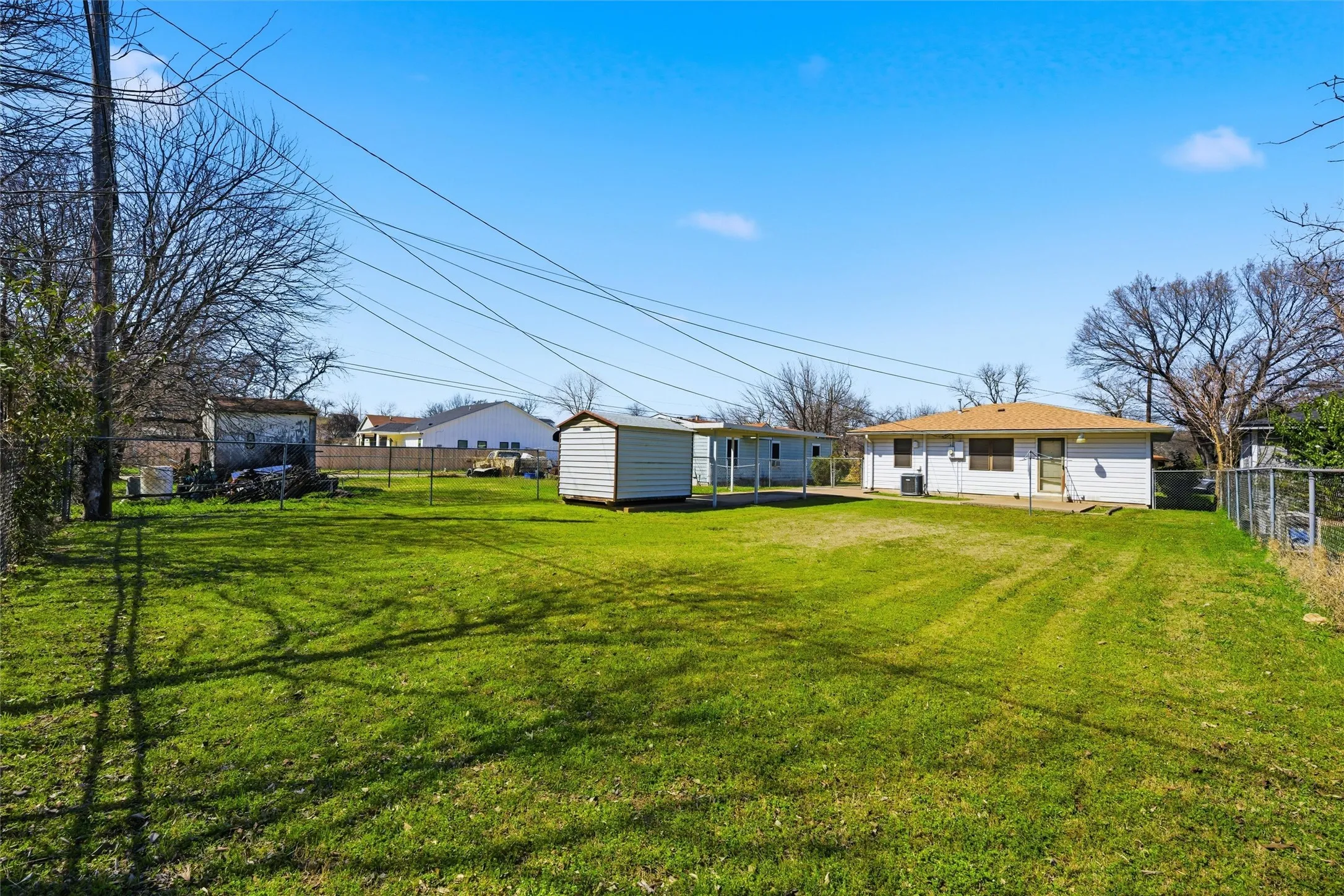 Large fenced yard with gate
