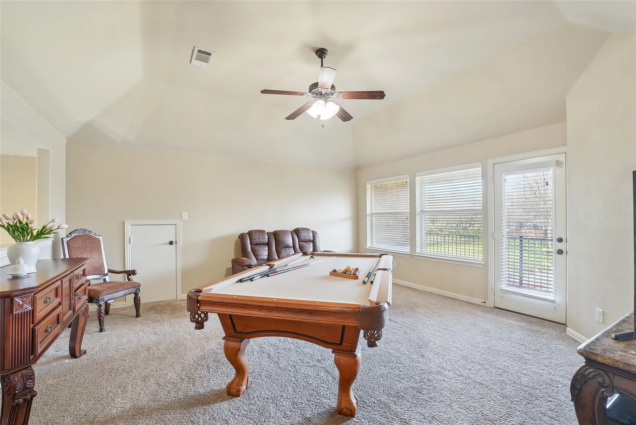Second Living Room/Game Room/Media in the 2nd floor over looking the pool.