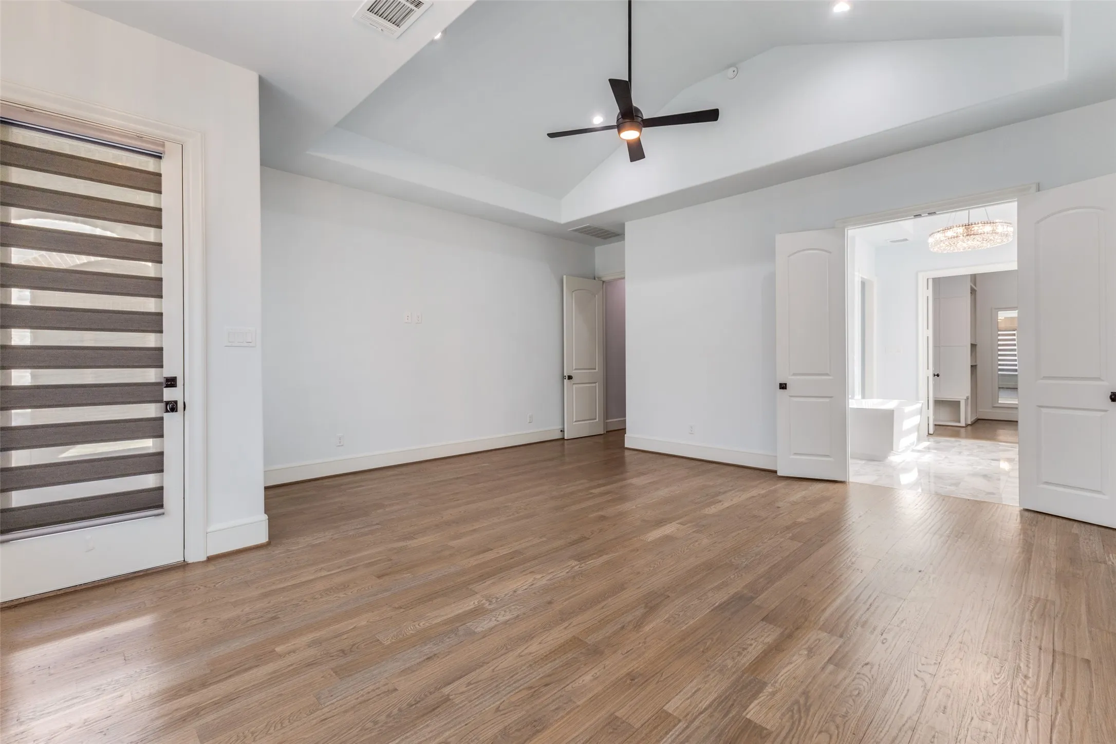 Primary Bedroom also offers direct access to outdoor patio.