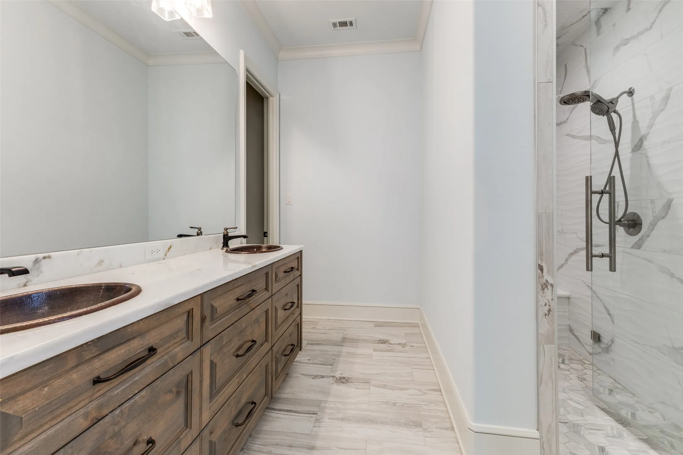 Second Primary Bath with double copper sinks, large walk-in shower with Mr. Steam technology, and huge closet!