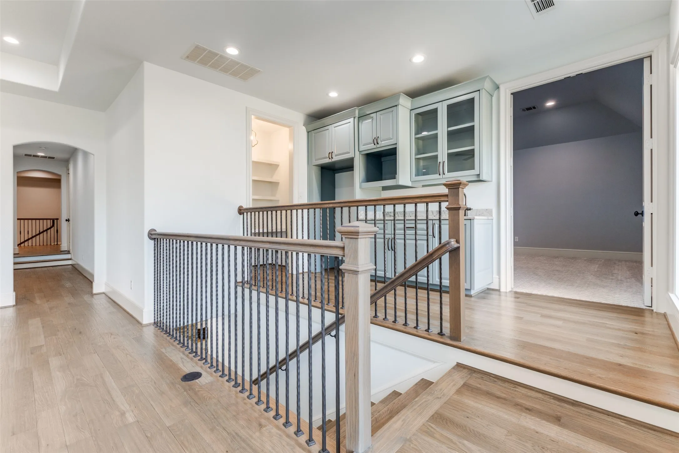 Upstairs wet bar perfectly positioned to serve Game Room and Home Theater.  Large storage closet as well.