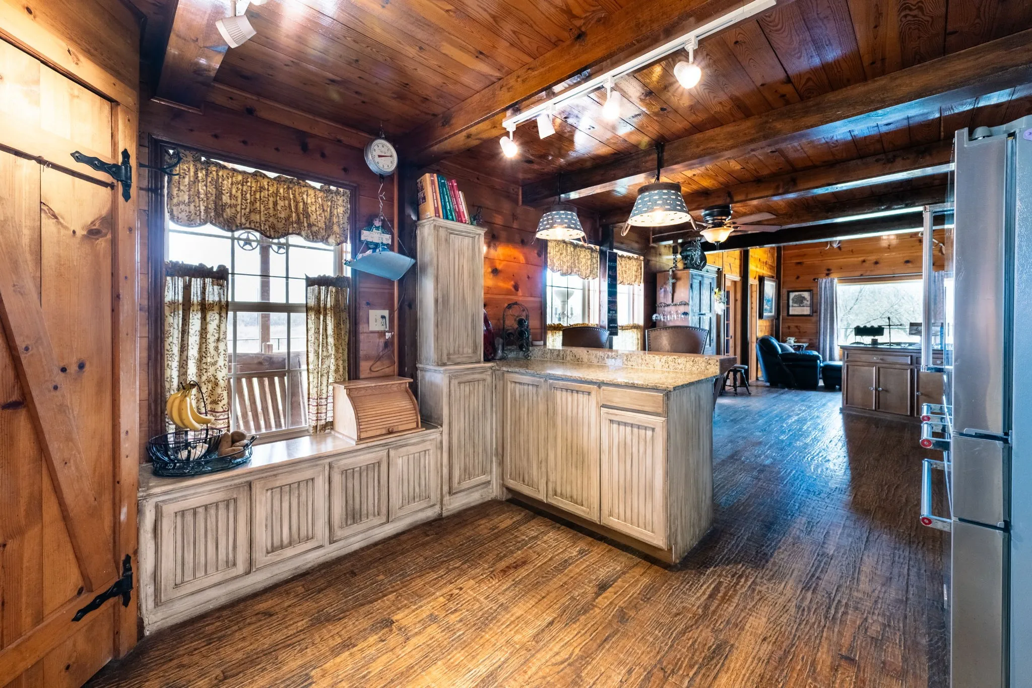 Corner pantry, wood floors, granite countertops