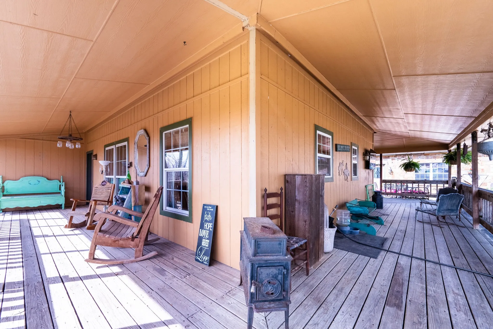 The porch truly wraps around the entire house adding additional entertaining space to this amazing property!