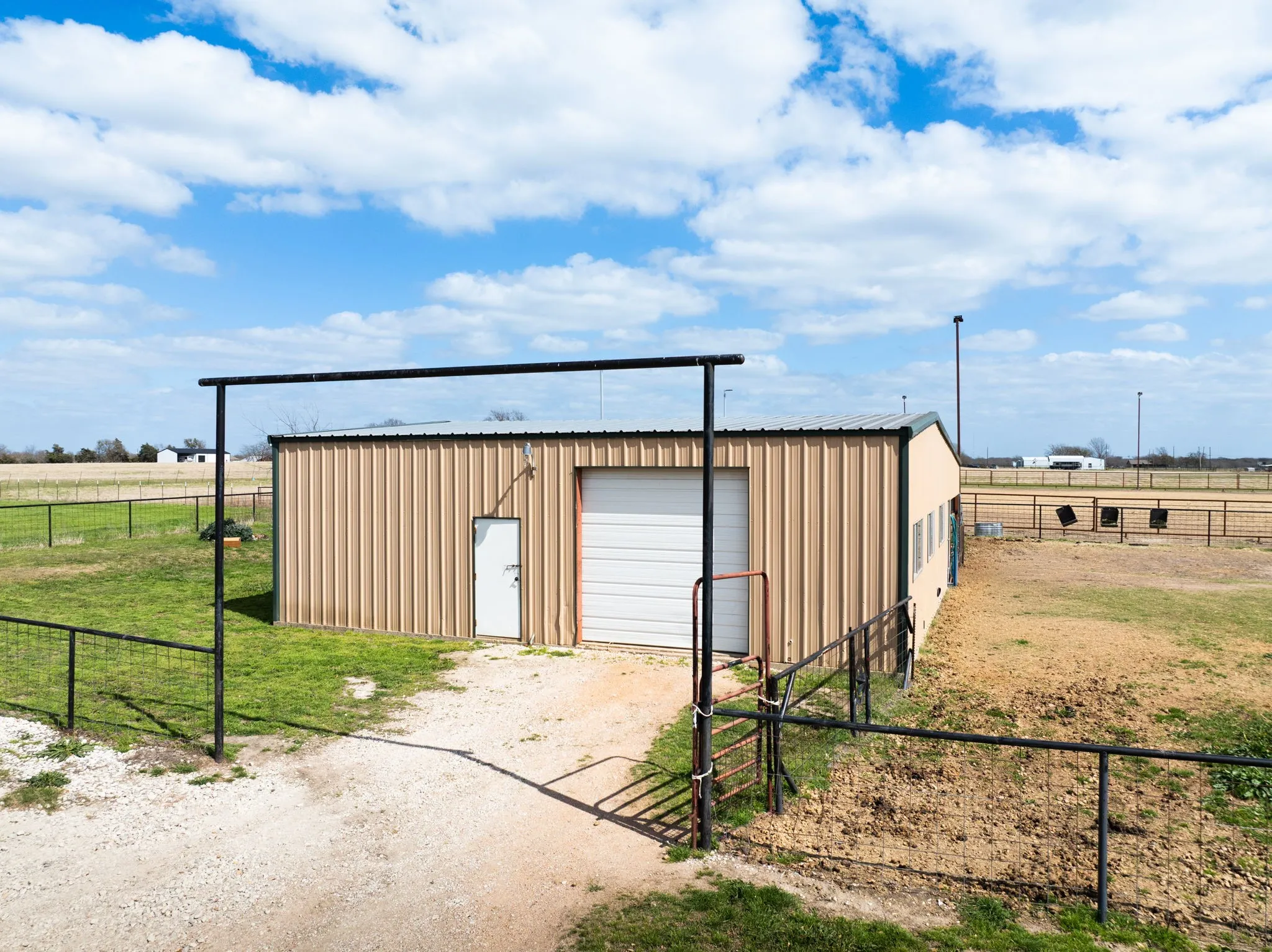 Shop-Barn is 40x60 with 10 ft roll up door and walk through door.