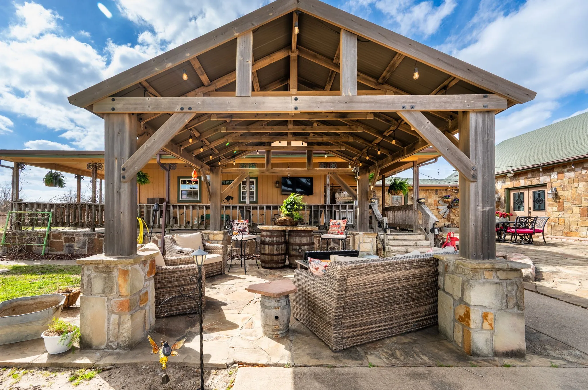 Covered entertainment area off the main house.