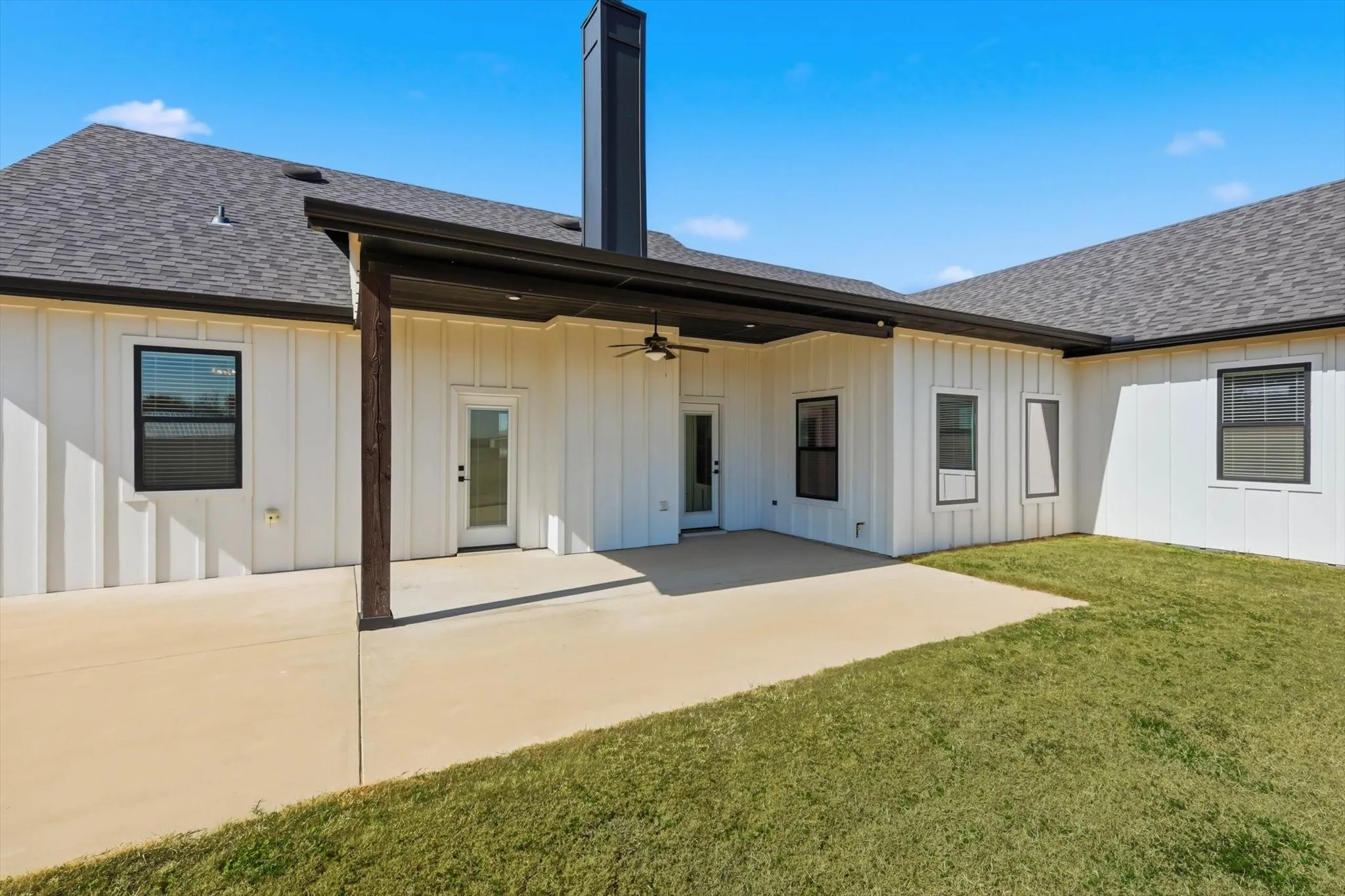 Built for outdoor living. Expansive patio space, modern farmhouse exterior, and a layout that makes the backyard feel like an extension of the home.