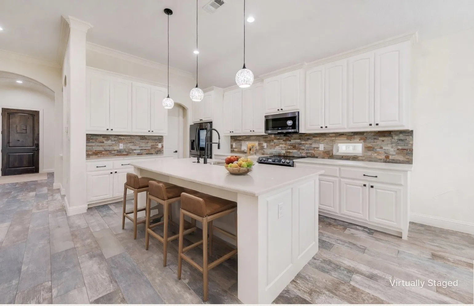 Living room and breakfast room are all open to this well appointed kitchen.