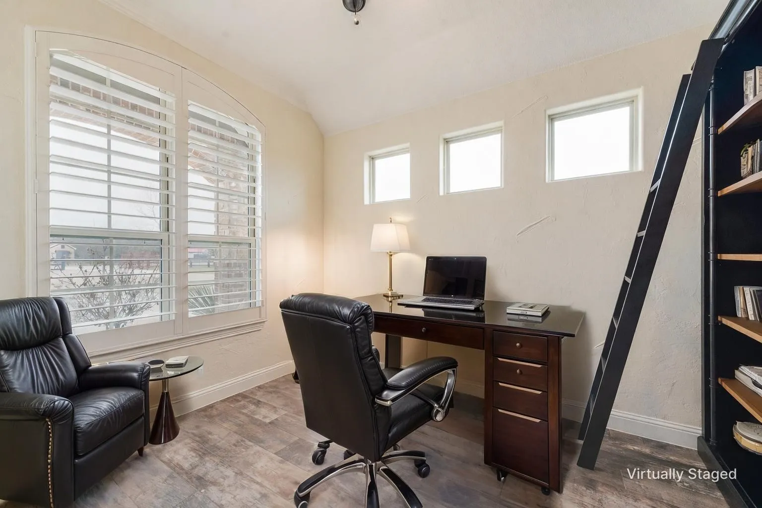 Right off of the front door, the office.