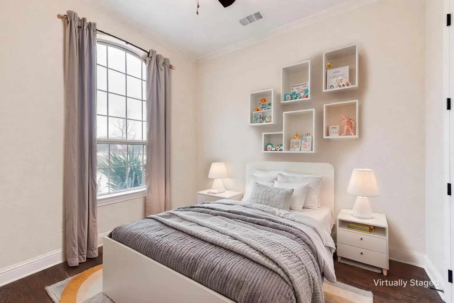 1 of 3 secondary bedrooms downstairs.