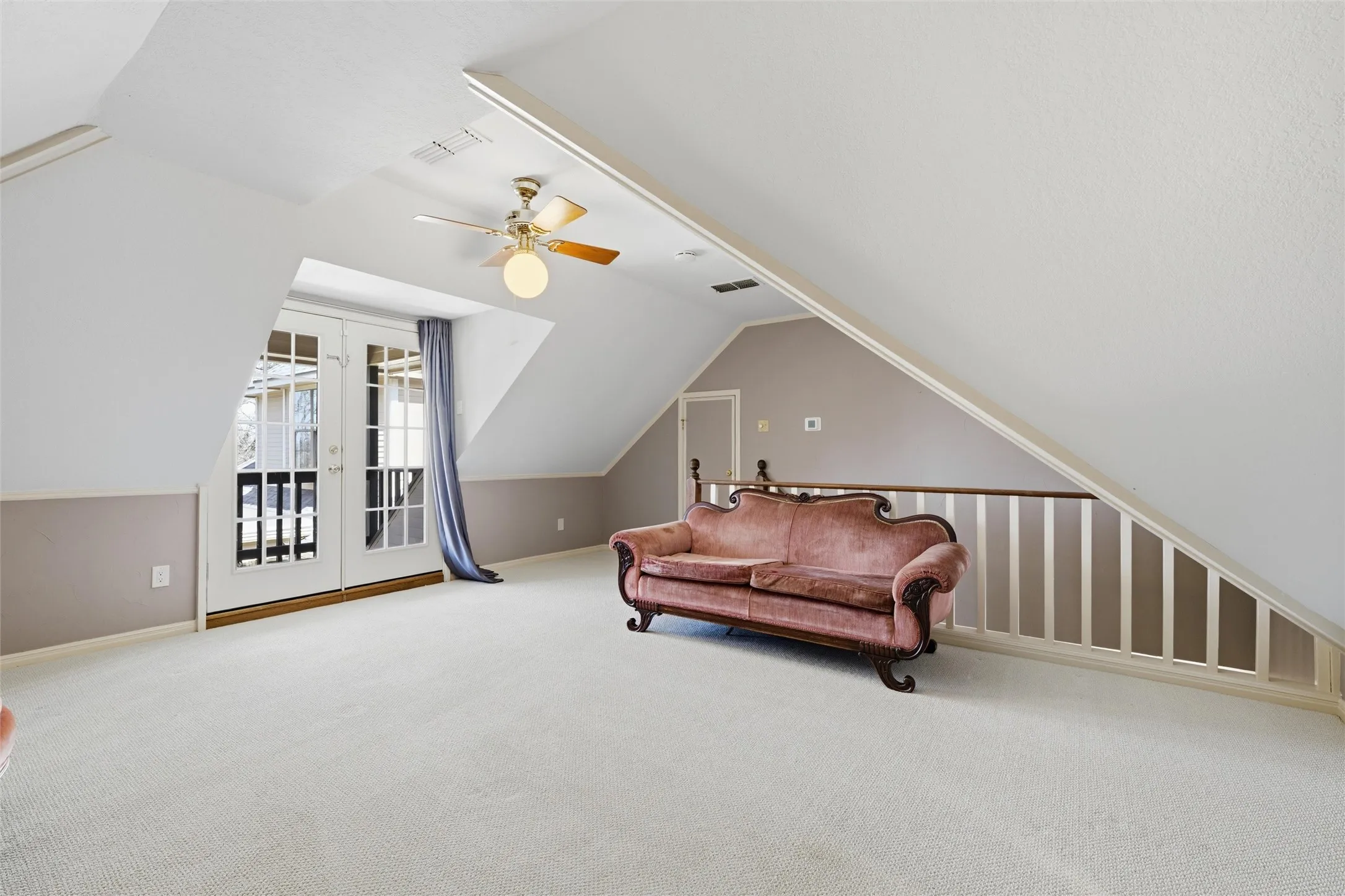 Game room with ceiling fan, carpet floors, and french doors