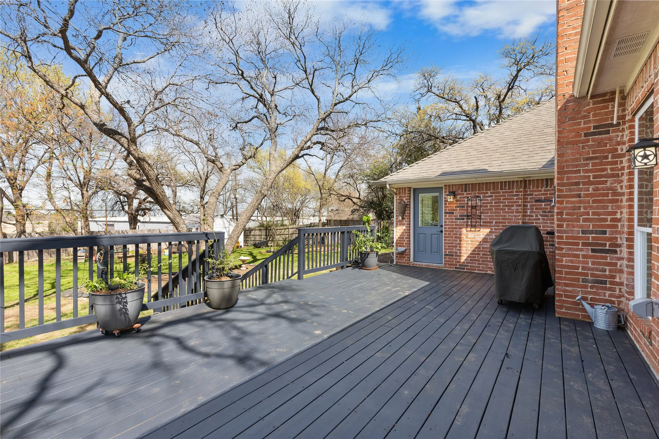 Wooden terrace with grilling area