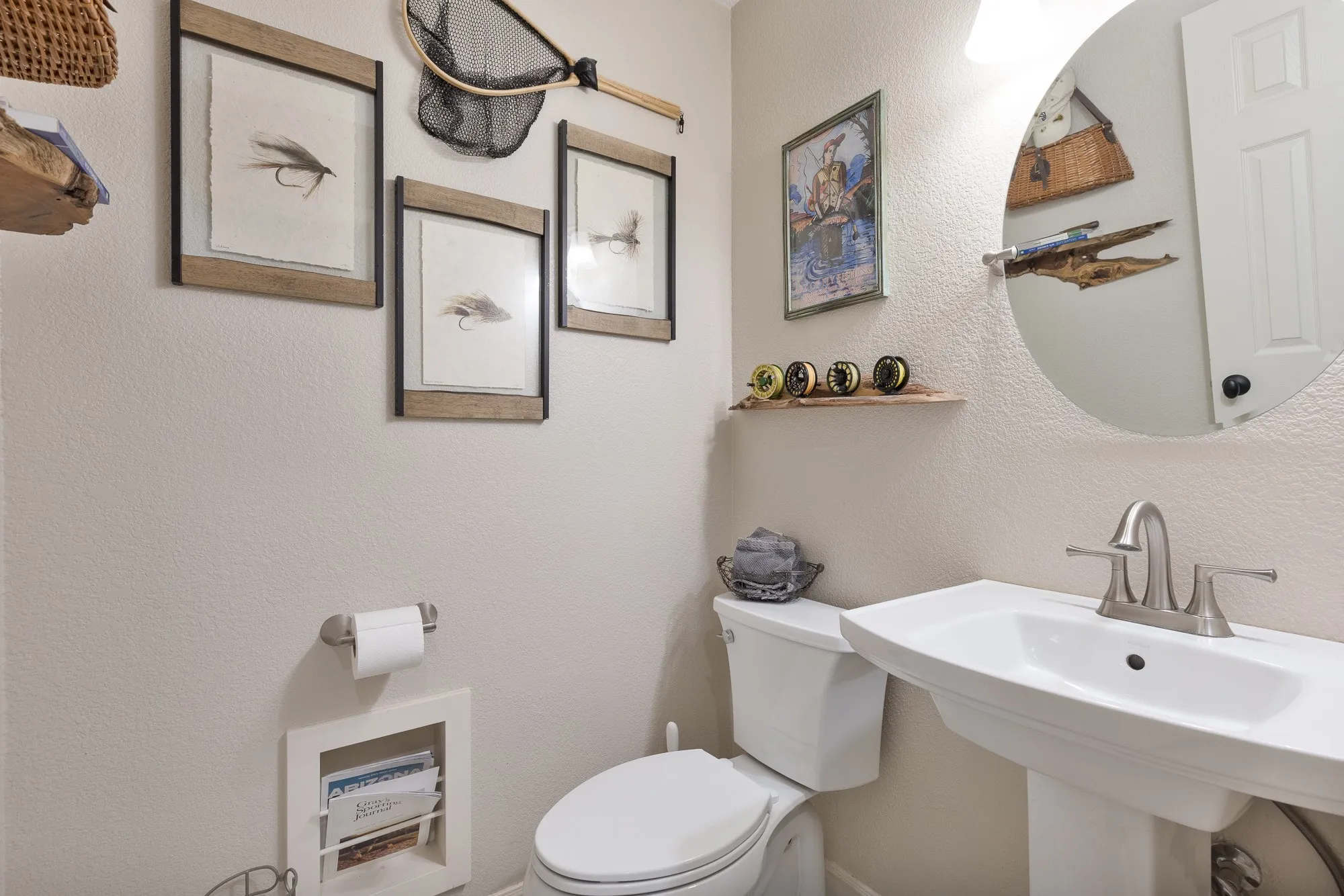 Half bathroom featuring toilet and a textured wall