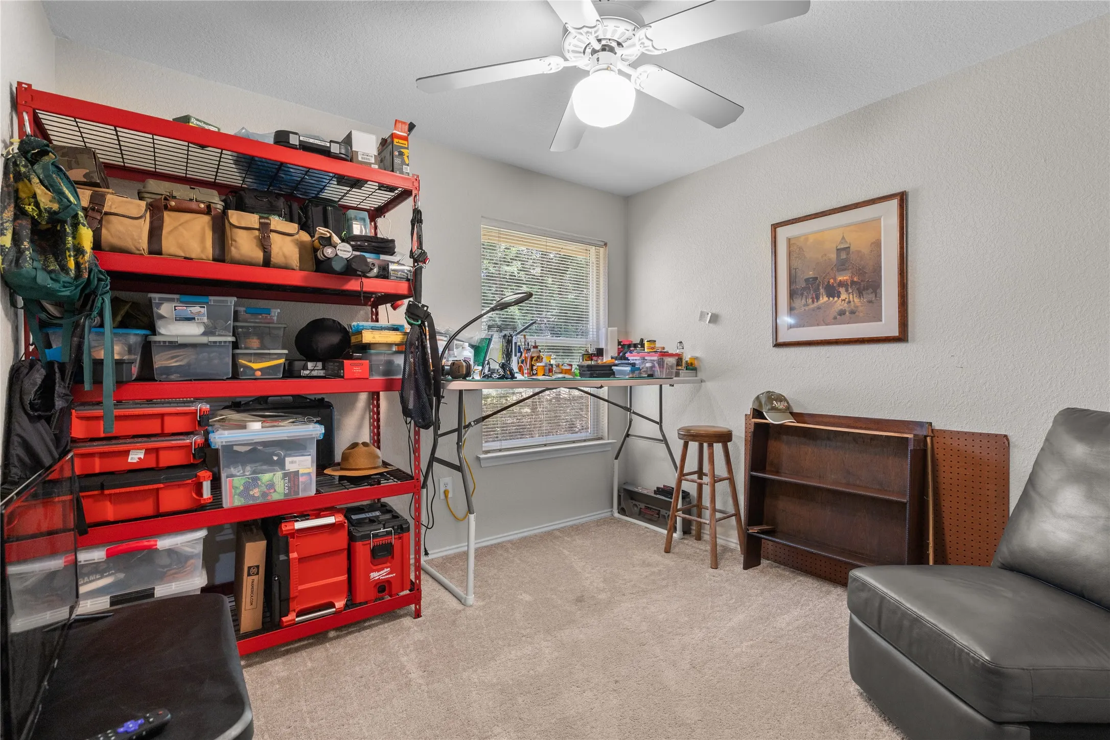 Bedroom used as his man cave craft room