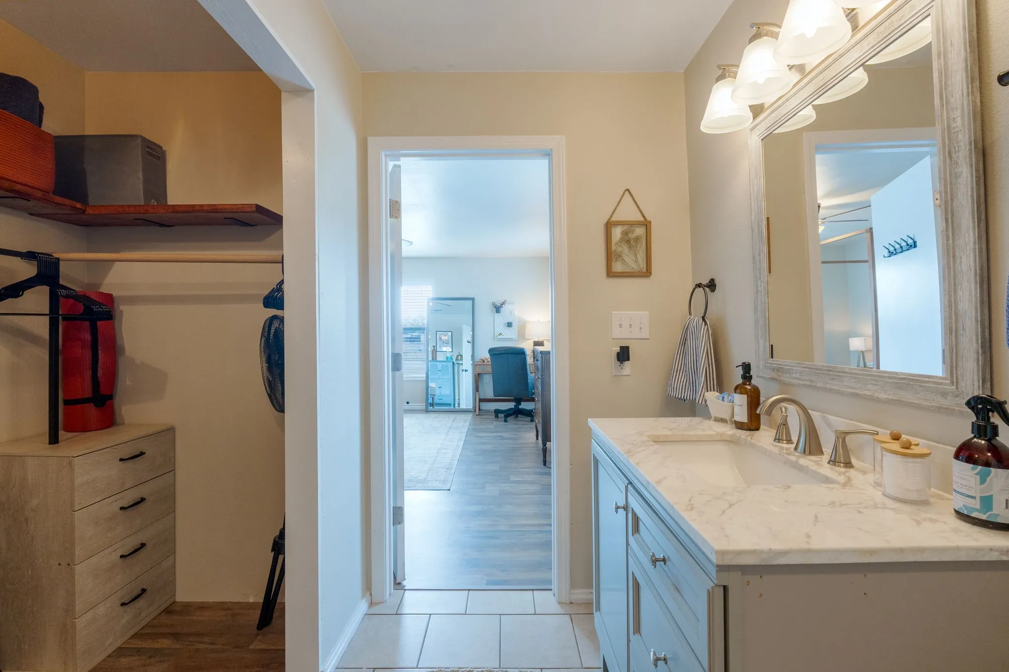 Bathroom featuring vanity and light tile patterned flooring