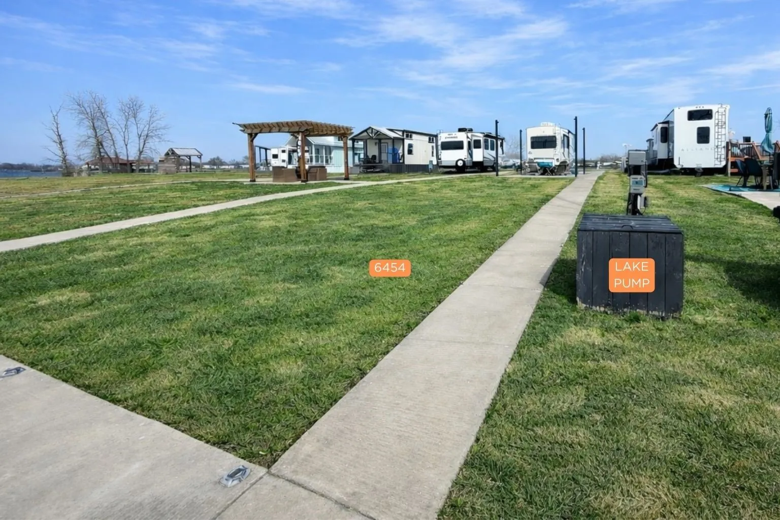 Lake pump and sidewalk access add convenience at 6454 Peninsula Road.