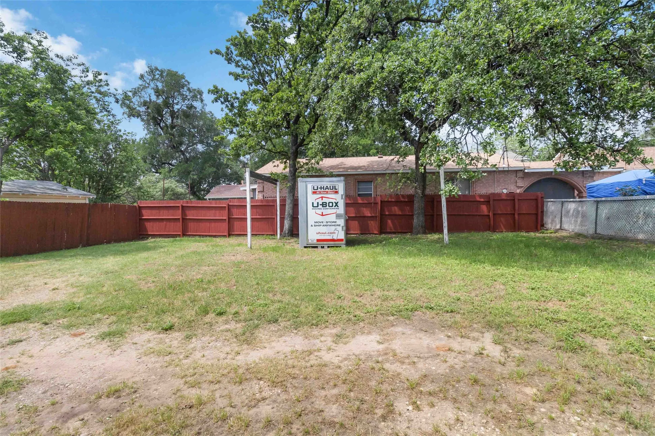 View of fenced backyard