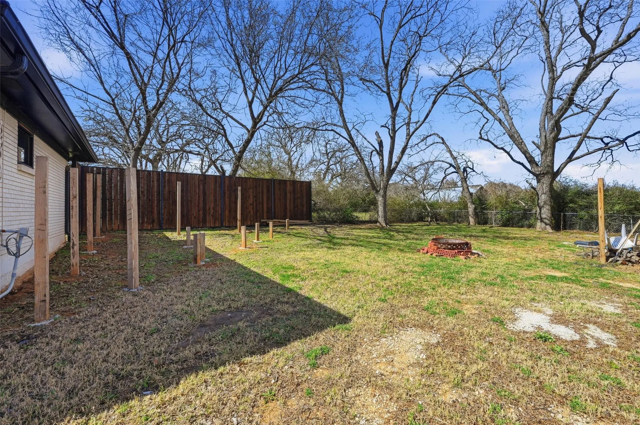 View of fenced backyard