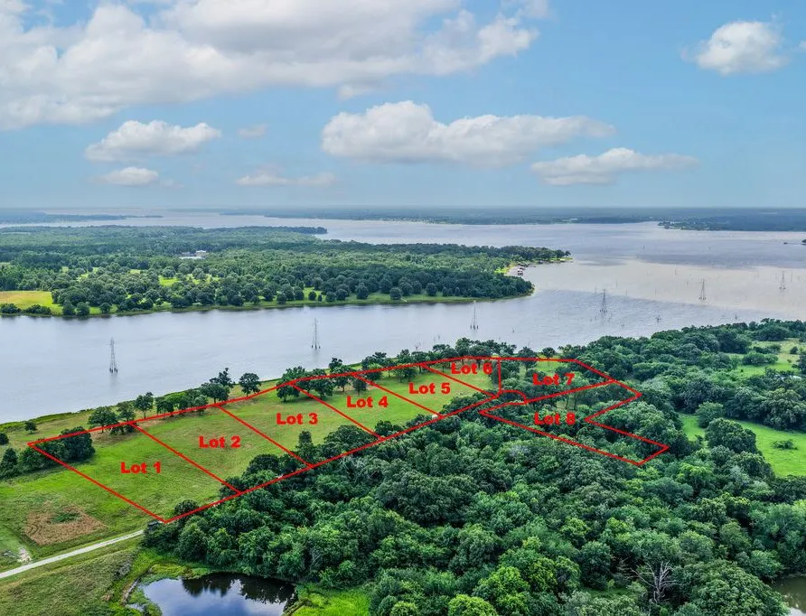 Lot Lines Approximate. Expansive waterfront lots with clear boundaries, bordering mature trees, and featuring direct water access