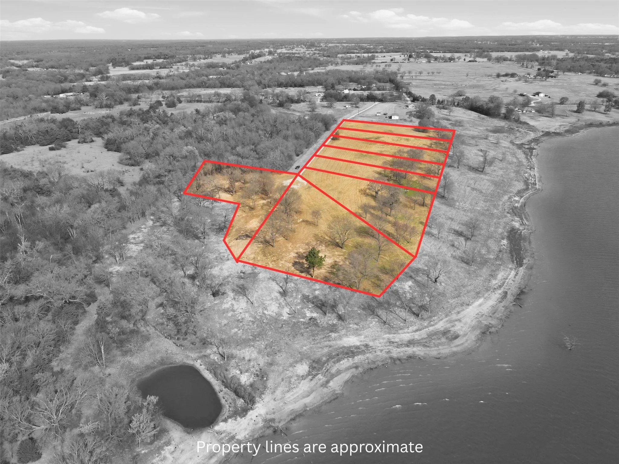 Approximate Lot Lines. Low Lake Level Photo.