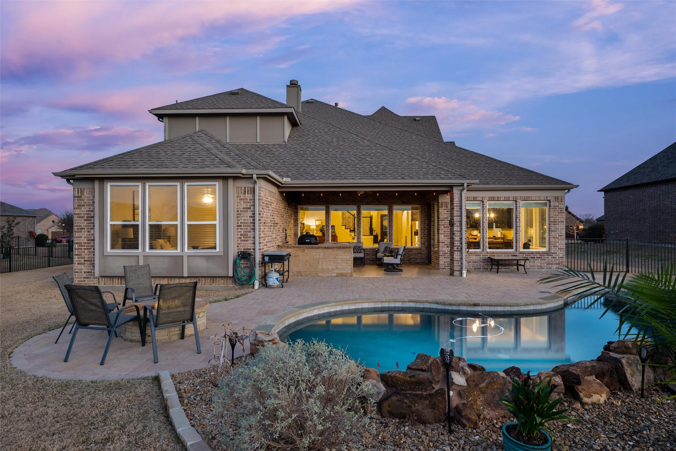 Saltwater pool, tanning ledge and firepit for resort living