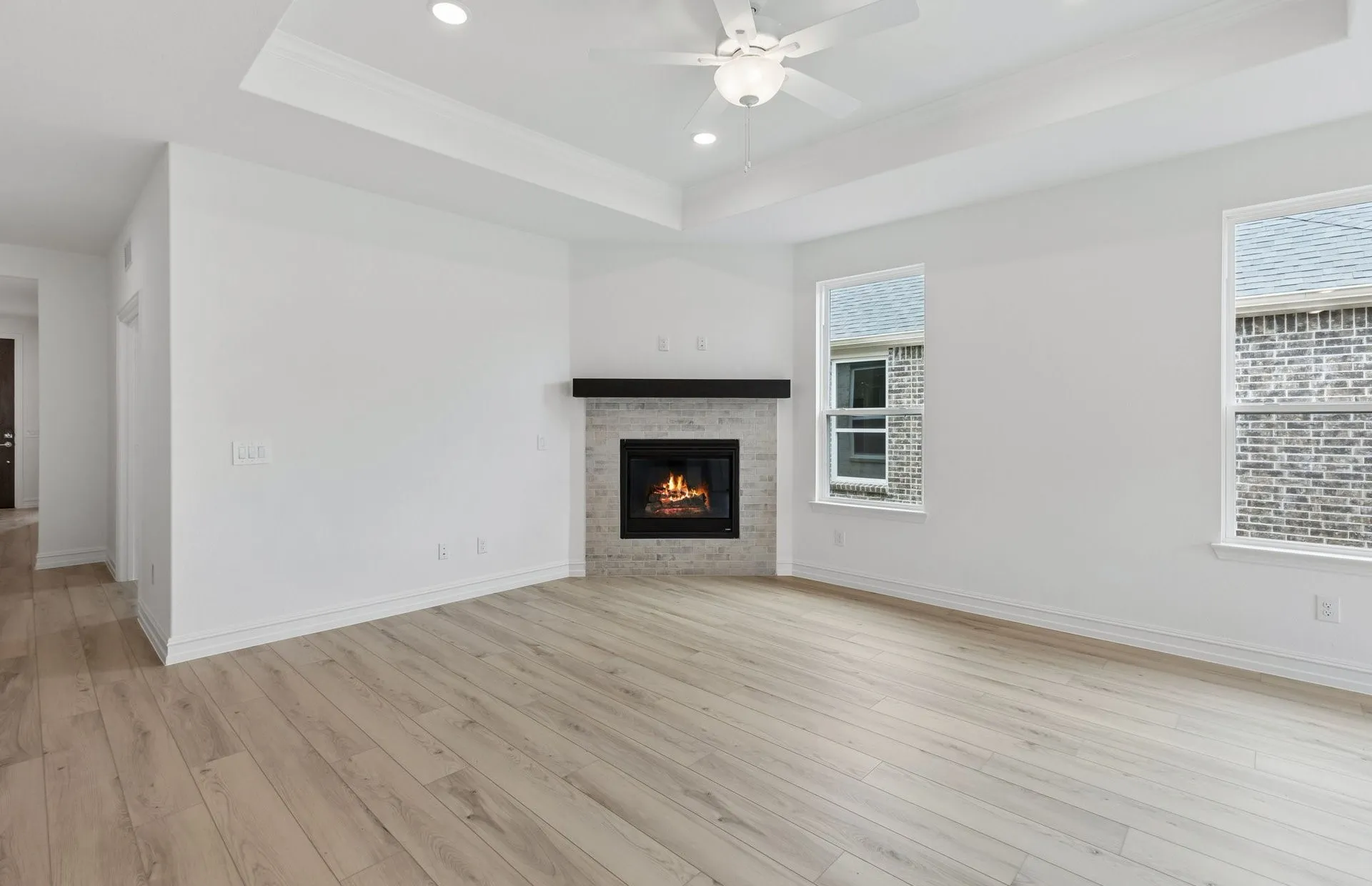 Spacious gathering room with beautiful fireplace