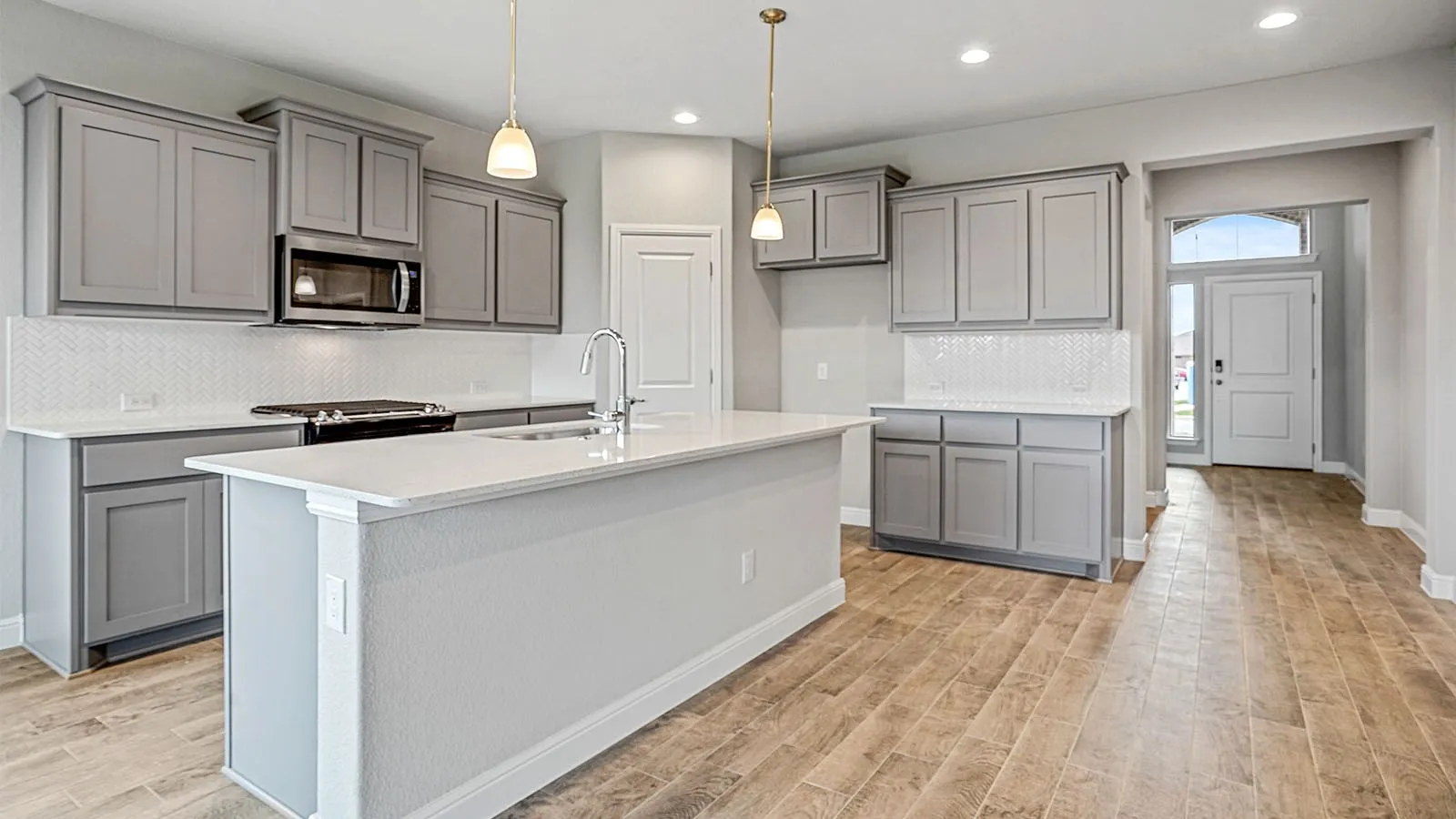 Kitchen-All Home and community information, including pricing, included features, terms, availability and amenities, are subject to change at any time without notice or obligation. All Drawings, pictures, photographs, video, square footages, floor plans, elevations, features, colors and sizes are approximate for illustration purposes only and will vary from the homes as built.