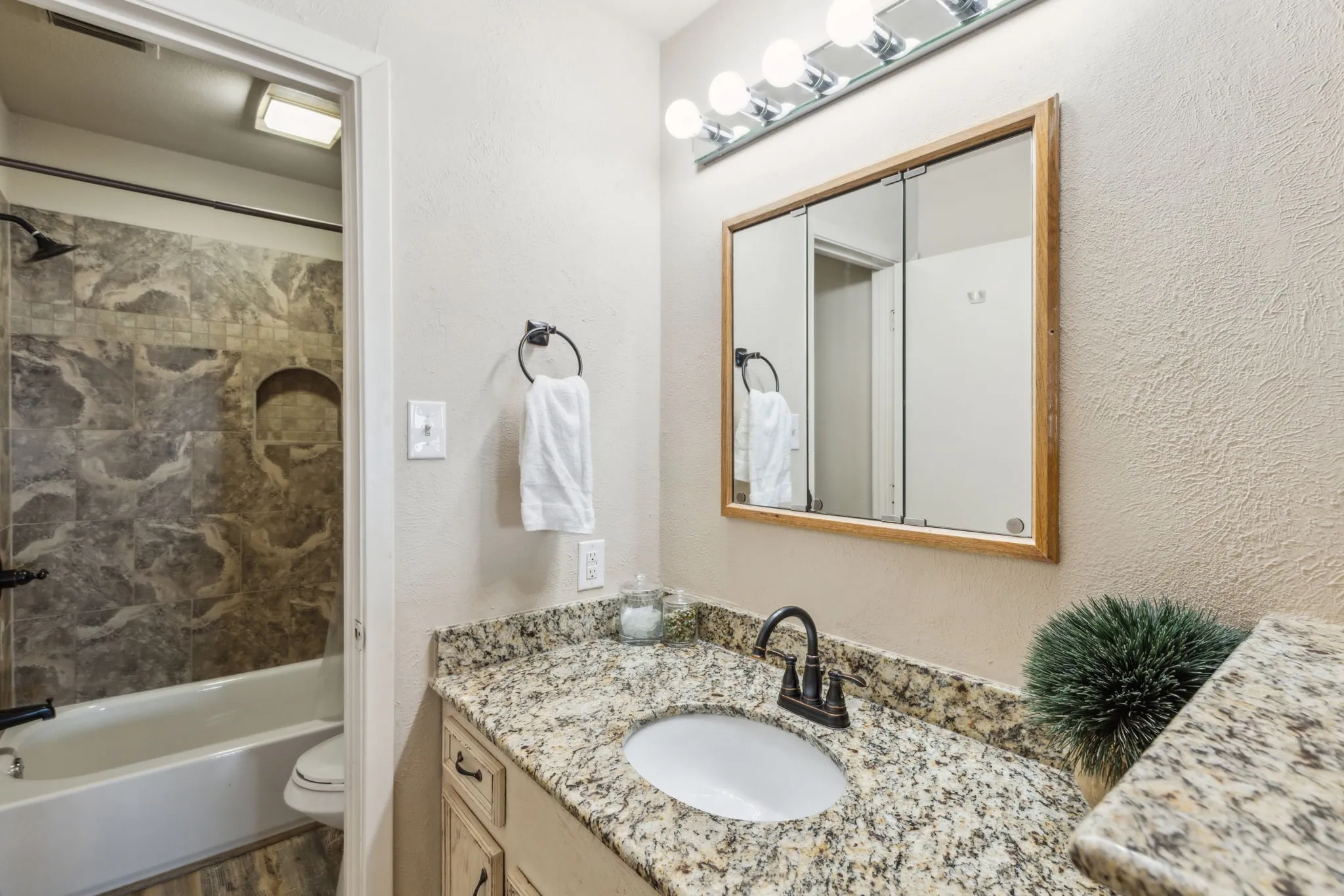 Guest bathroom located in guest bedroom.