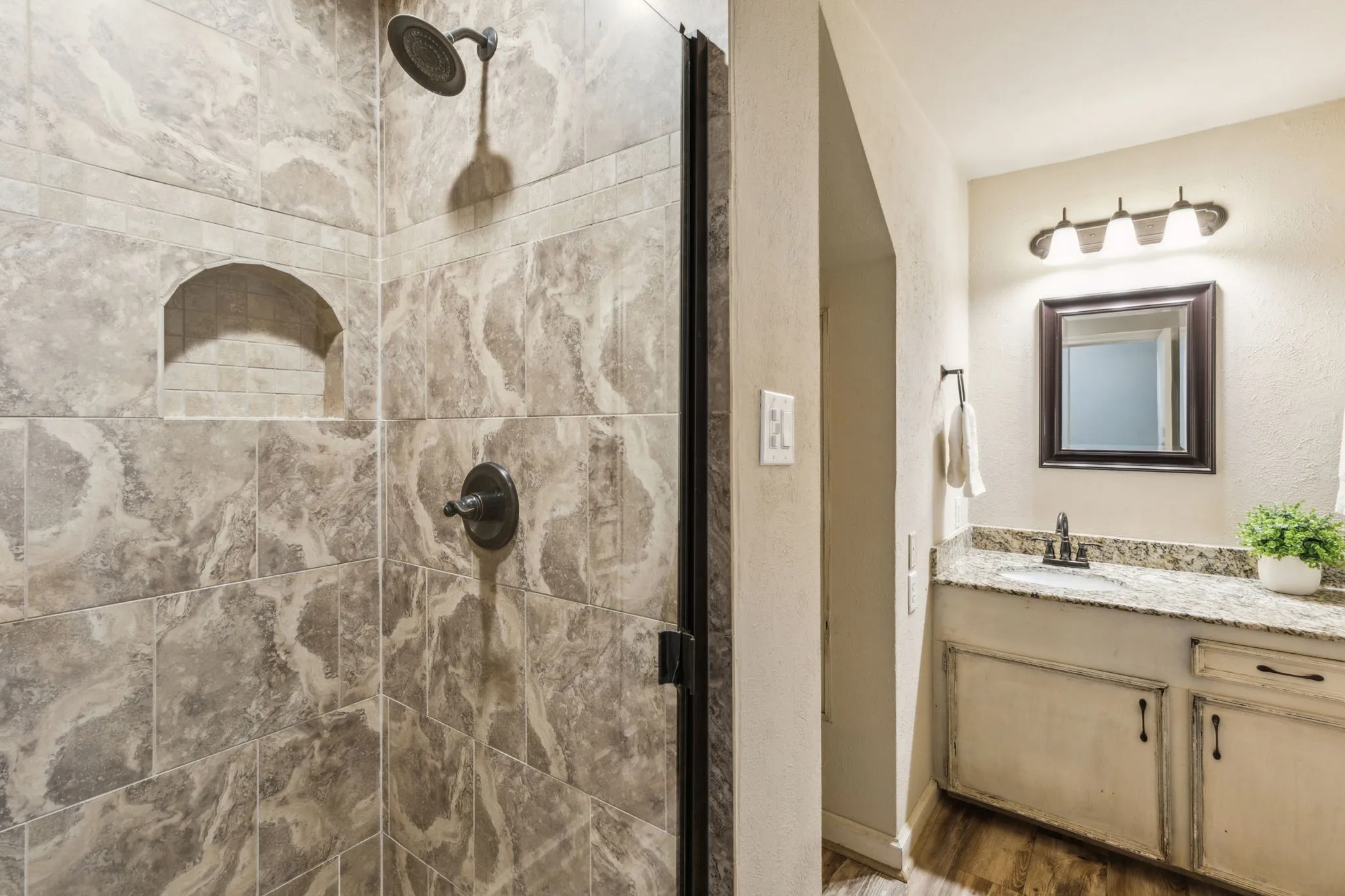 Guest bathroom services all guest and one guest bedroom.