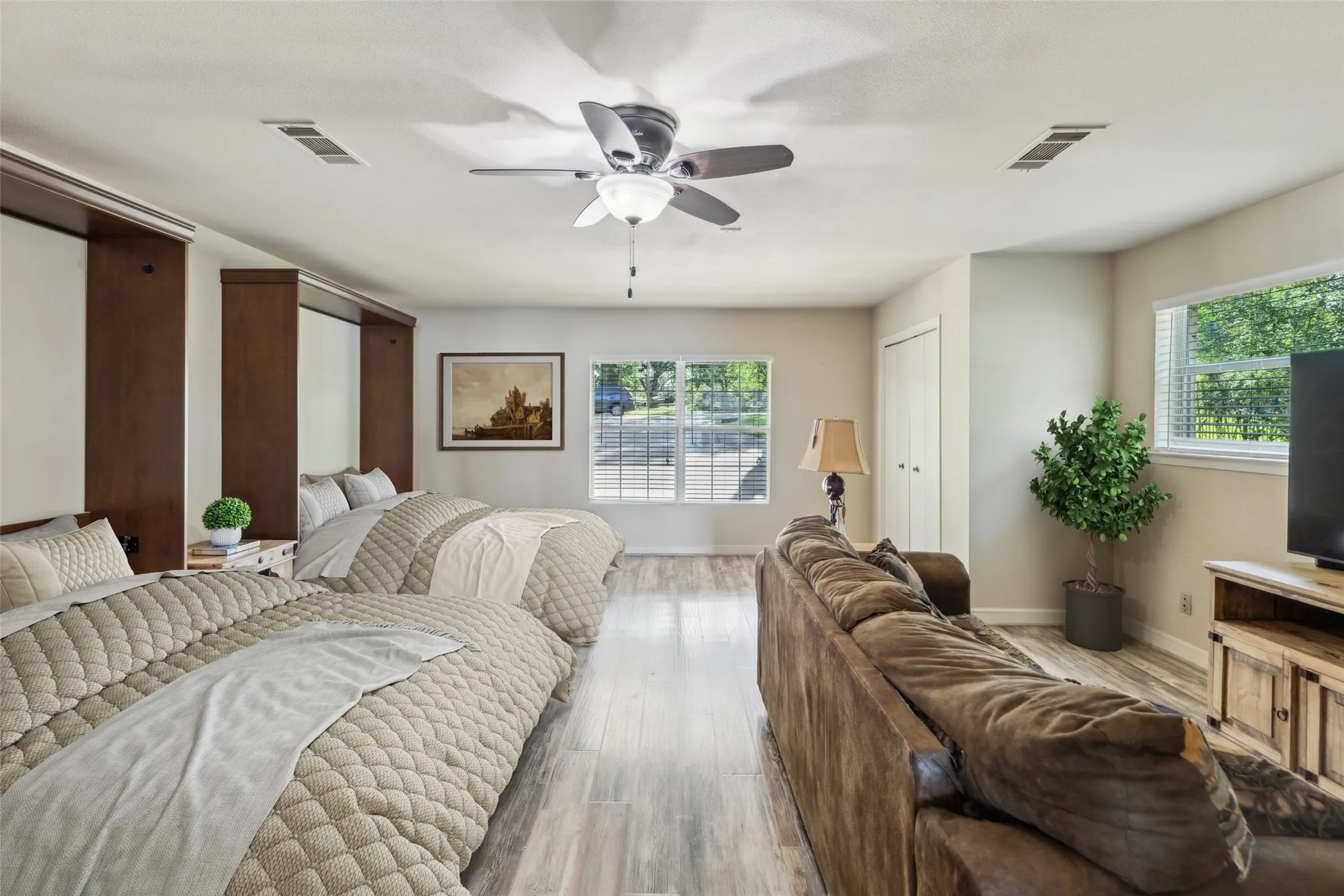 Spacious game room can also be a 5th bedroom currently setup to sleep 4 with 2 queen murphy beds.