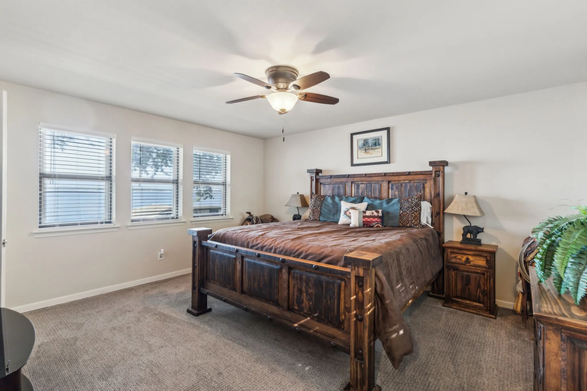 Guest bedroom with room for a king bed and en suite bathroom. Generous walk in closet.