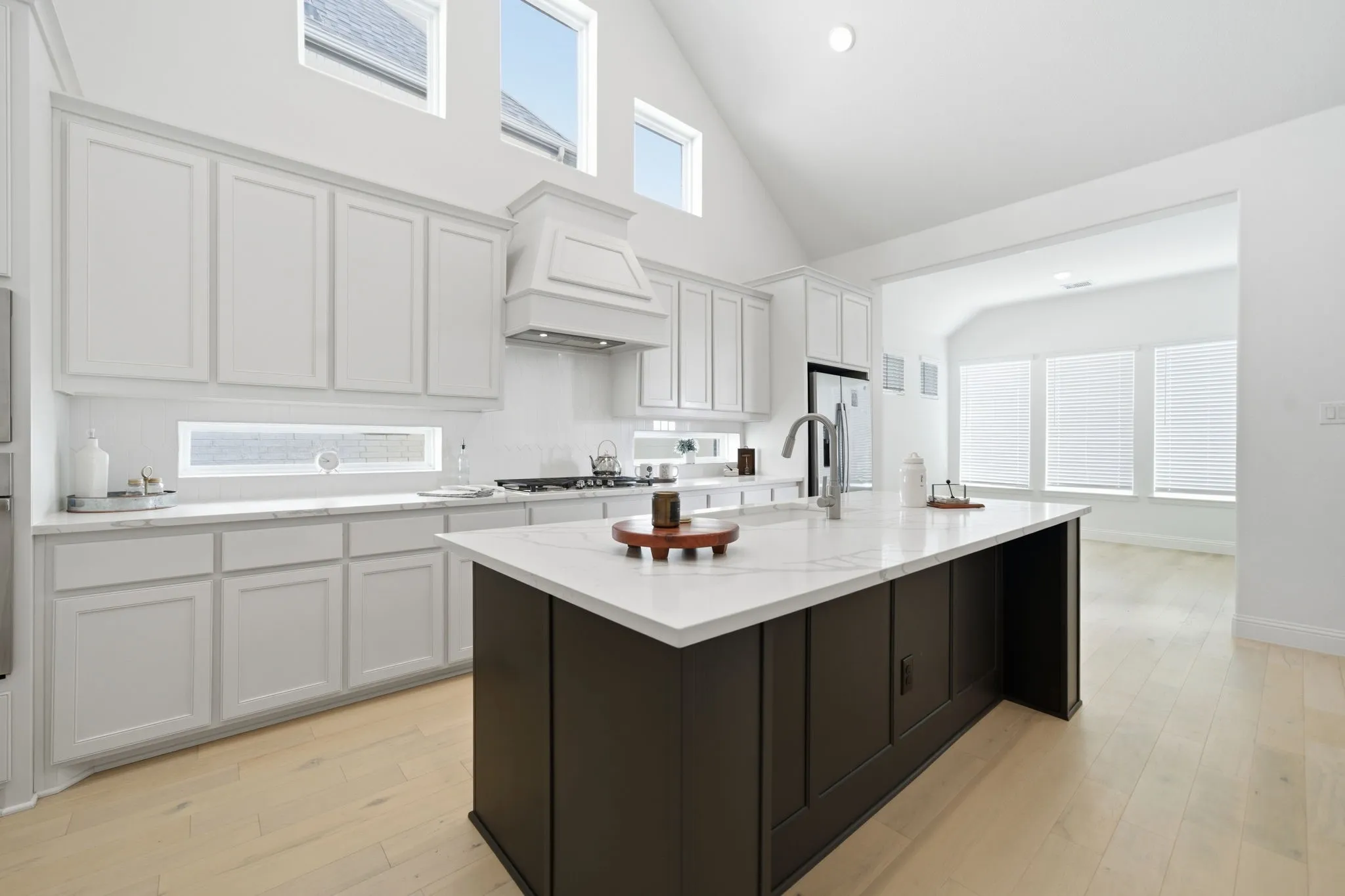 Kitchen with dining room in background