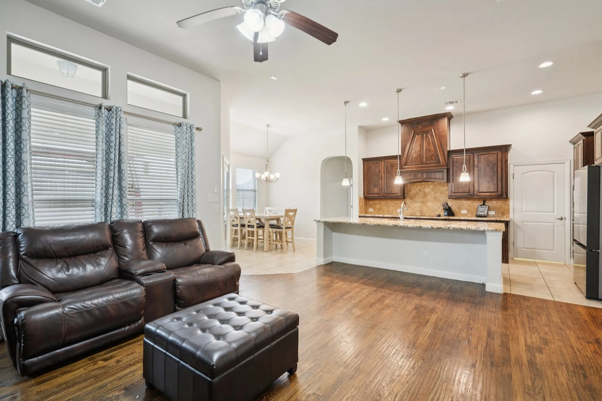 Open concept kitchen and living area showcasing a seamless, open floor plan.