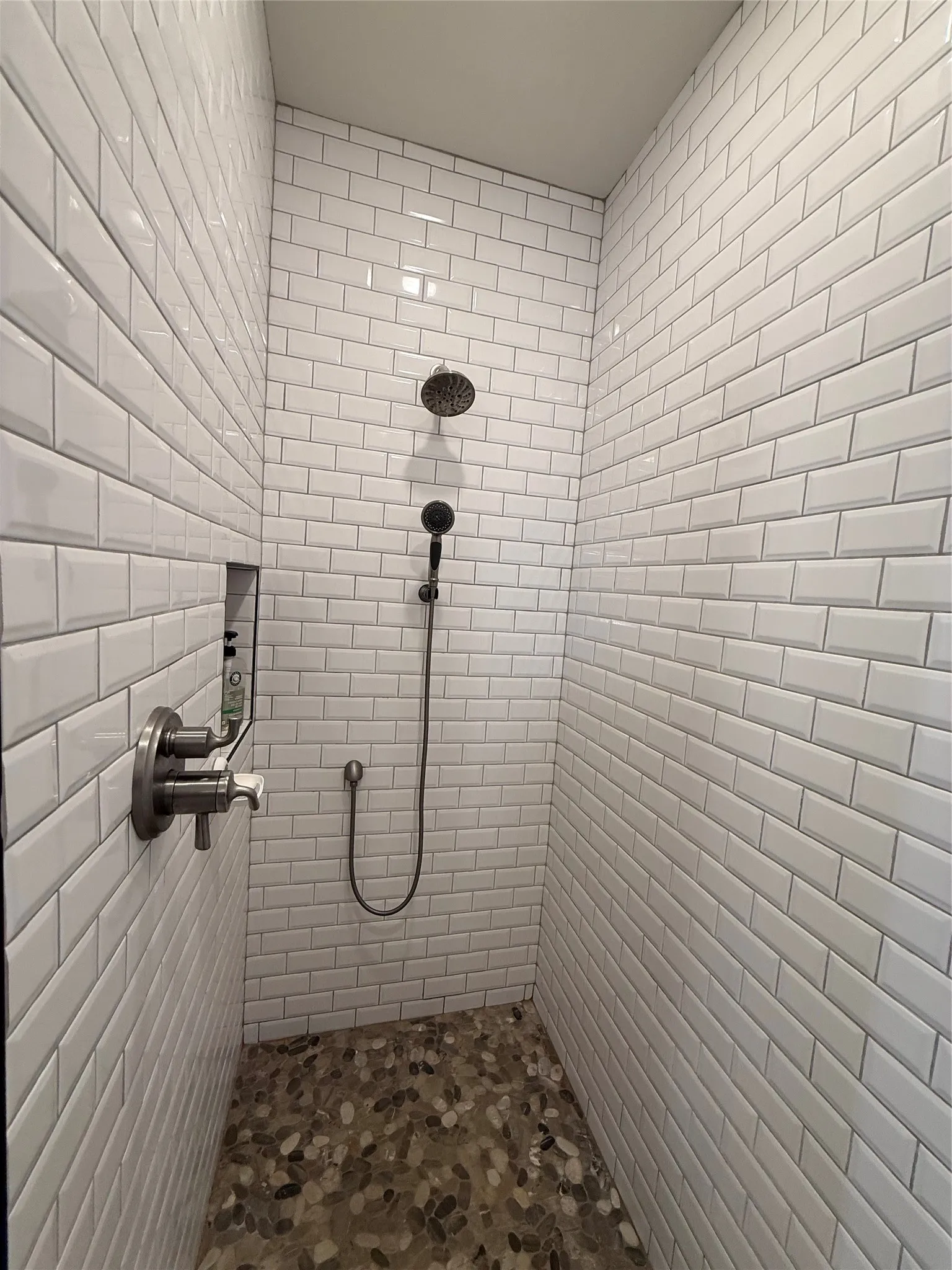 Full bath with tiled shower