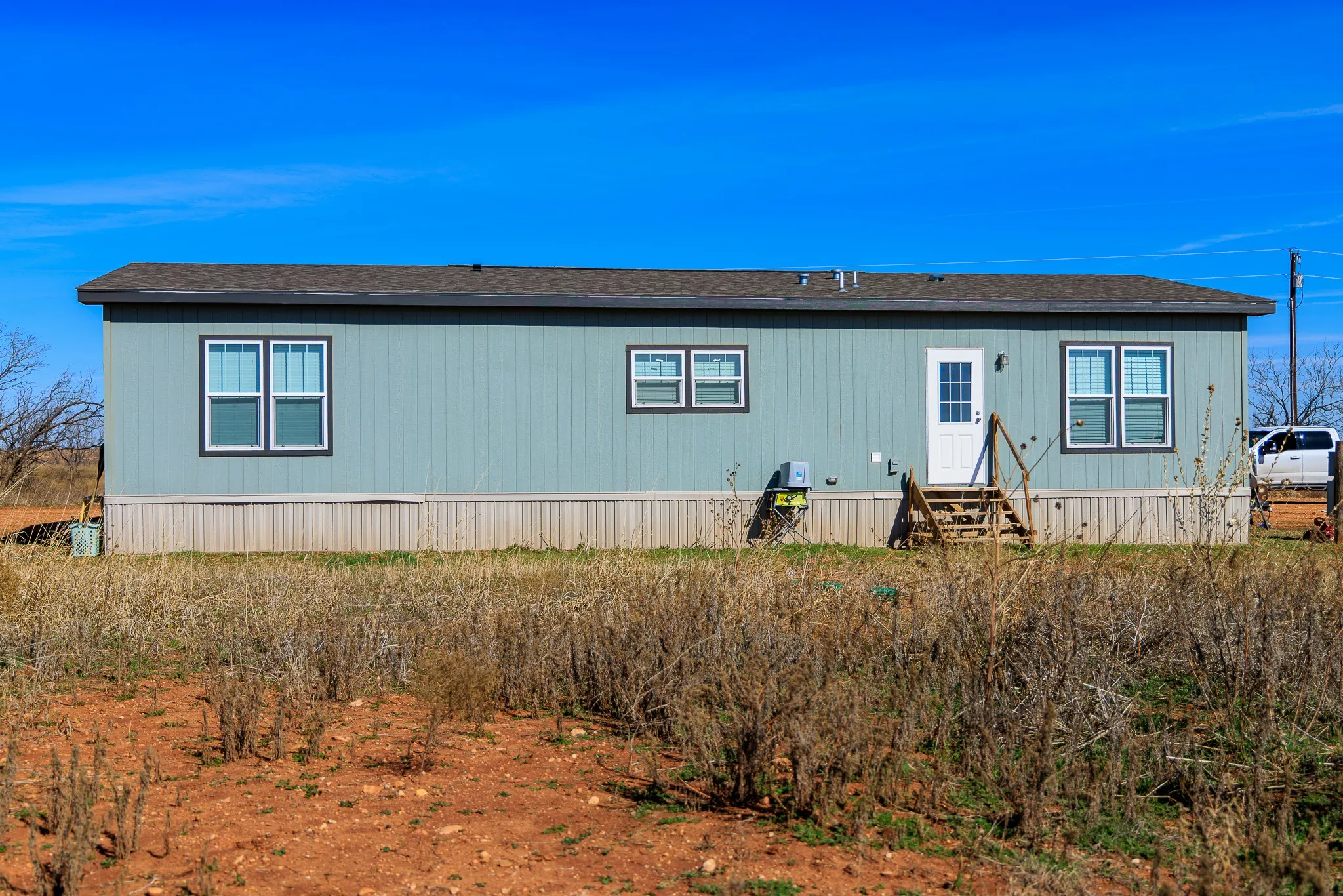 Manufactured Home For Sale in Jones County , 10099 County Road 452, Merkel, Texas 79536, 3 Bedroom, 2 Bathroom, Garage spaces, 1,680 Sqft, built in 2023, mls#21186534, Real Estate Agent in Merkel, Homes For Sale in Jones county, Homes For Sale in Merkel, Realtor in Merkel Texas, Real Estate Brokerage Independent Realty Texas, Luminita Cordes Realtor