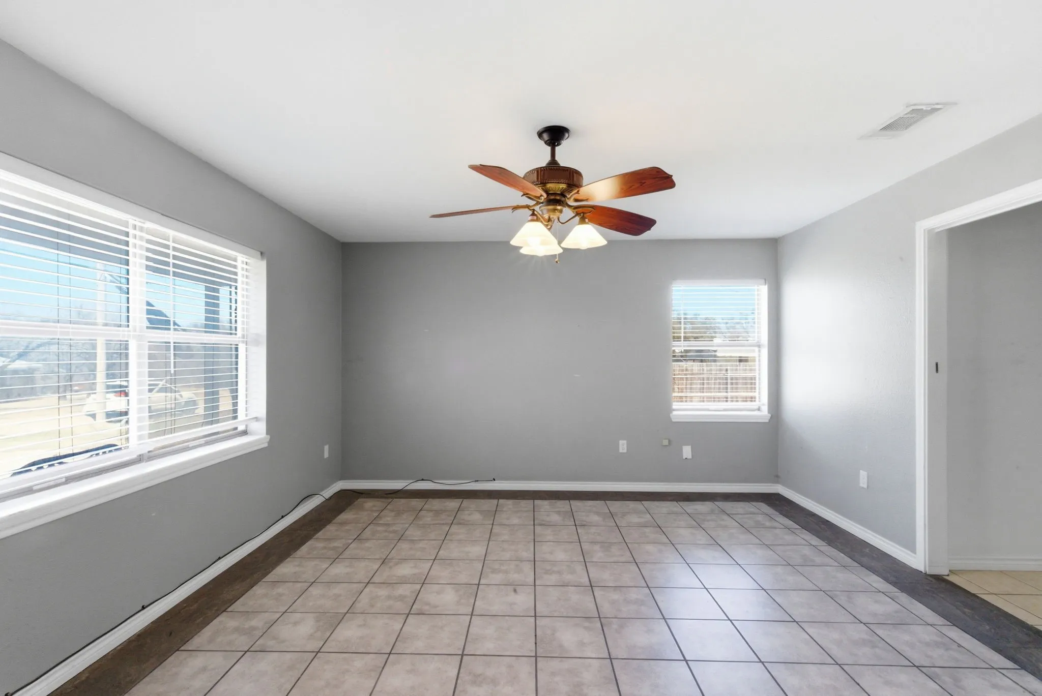 bonus room would make a great dining room or office.