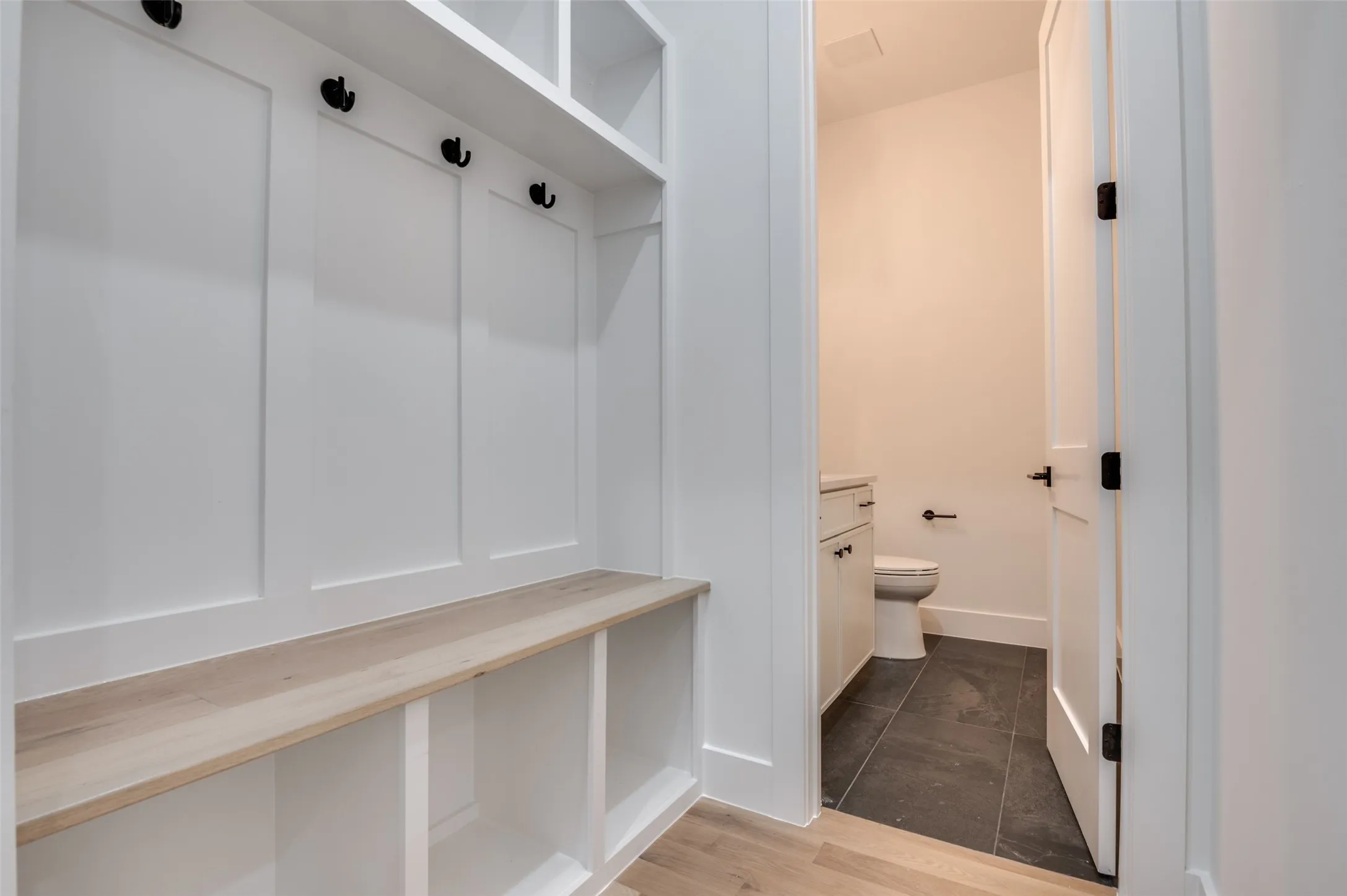 Mudroom featuring wood finished floors