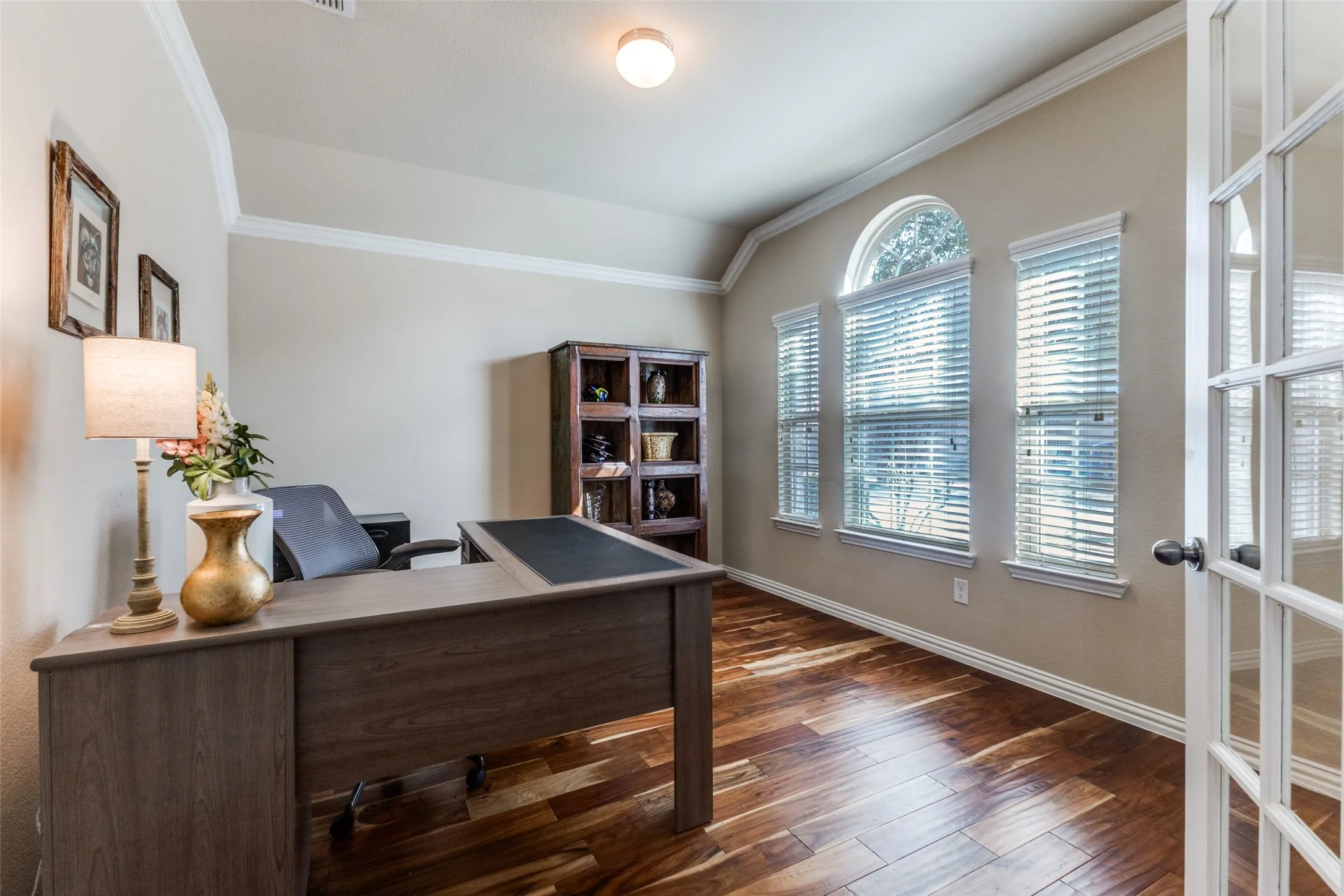 The study with French doors is located at the front of the home.