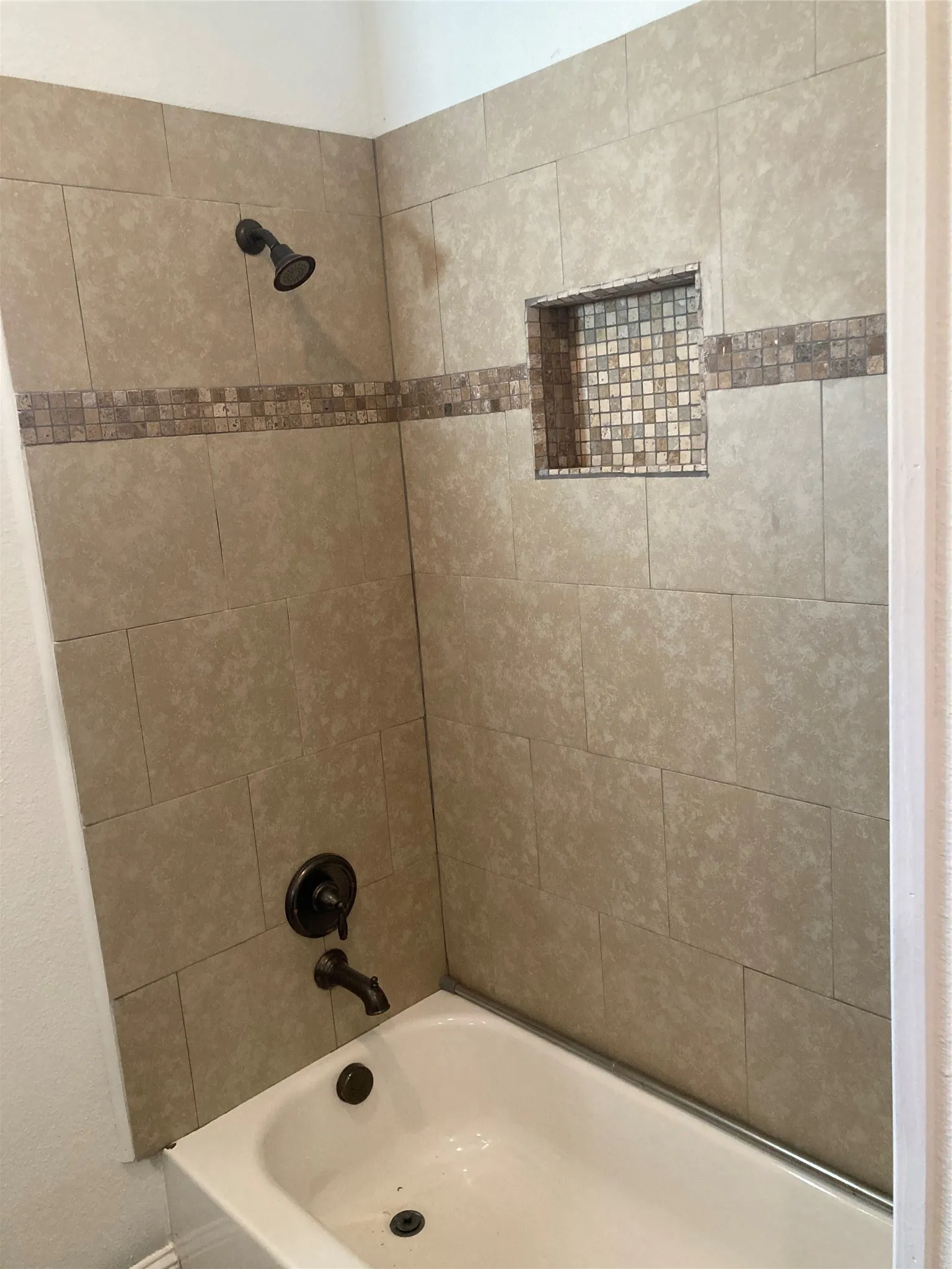 Bathroom #2 has a tub/shower combination.