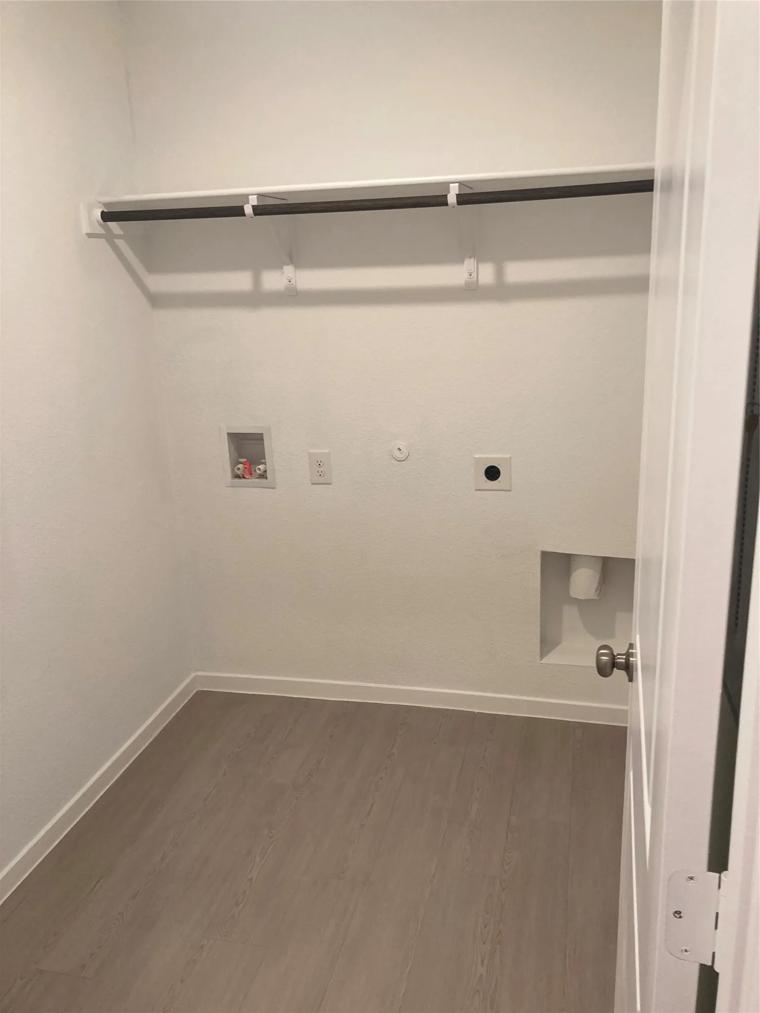 Laundry Room has hook ups for an electric dryer and washer.