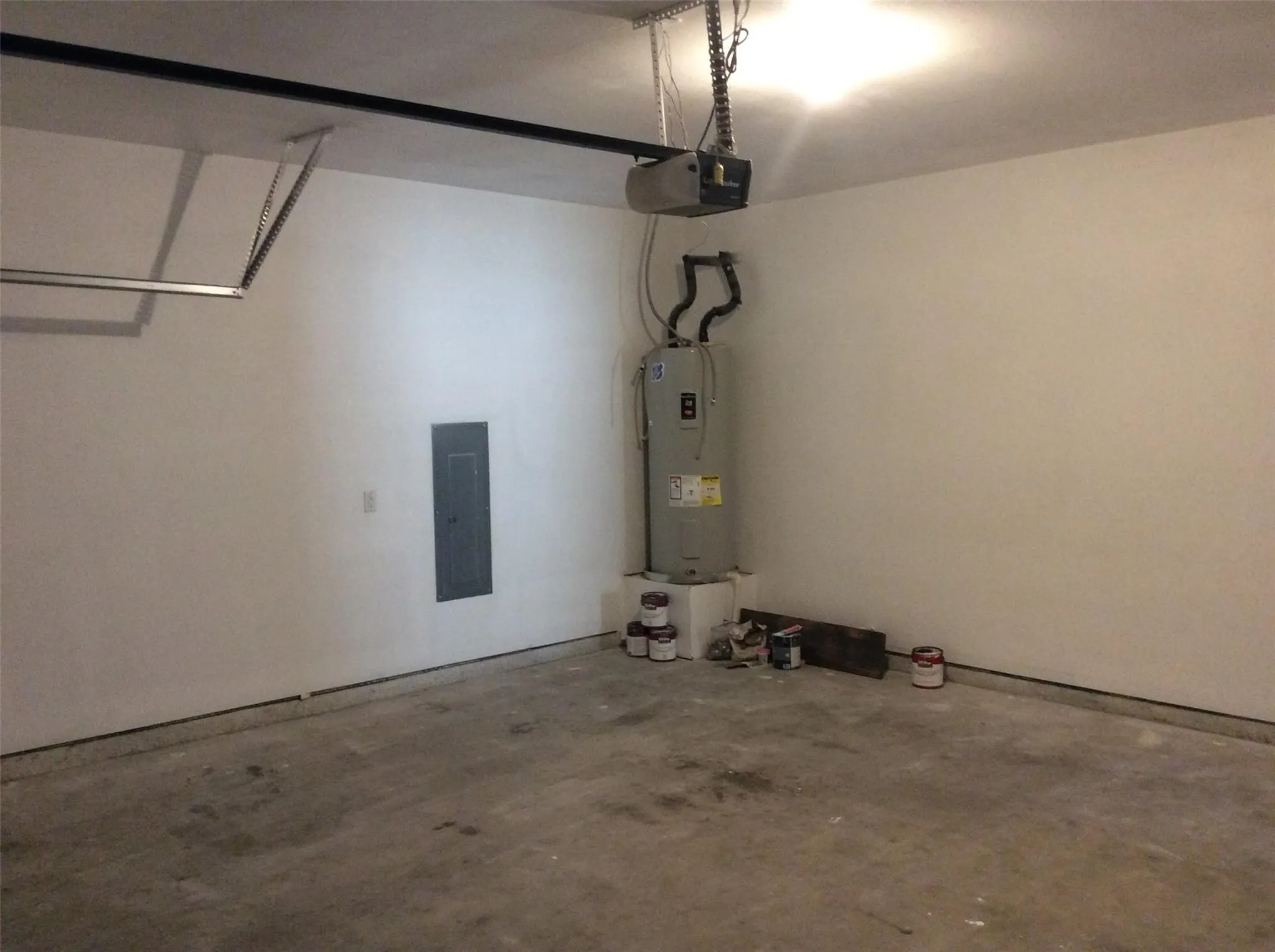 Garage has automatic garage door opener.  Electric water heater is located in the garage.