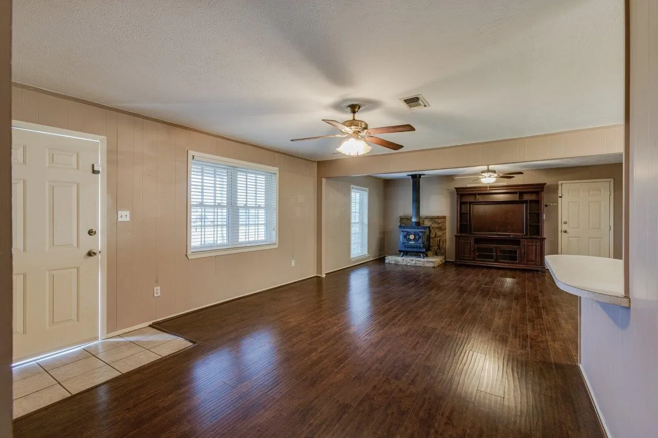 Two large living areas open to each other (photo from 2023, currently tenant occupied).