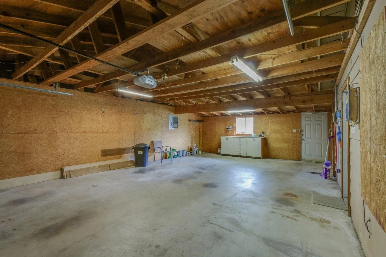 The garage was also added on to the original structure (photo from 2023, currently tenant occupied).