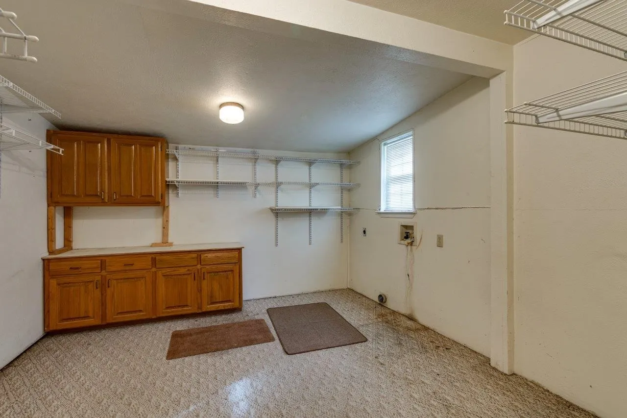 The laundry room was added on (photo from 2023, currently tenant occupied).