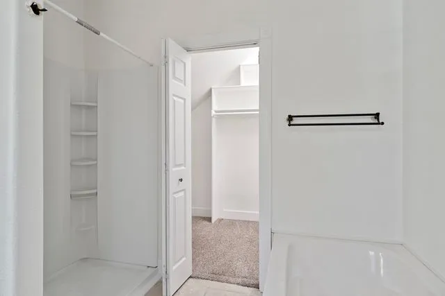 Primary bath with walk in closet