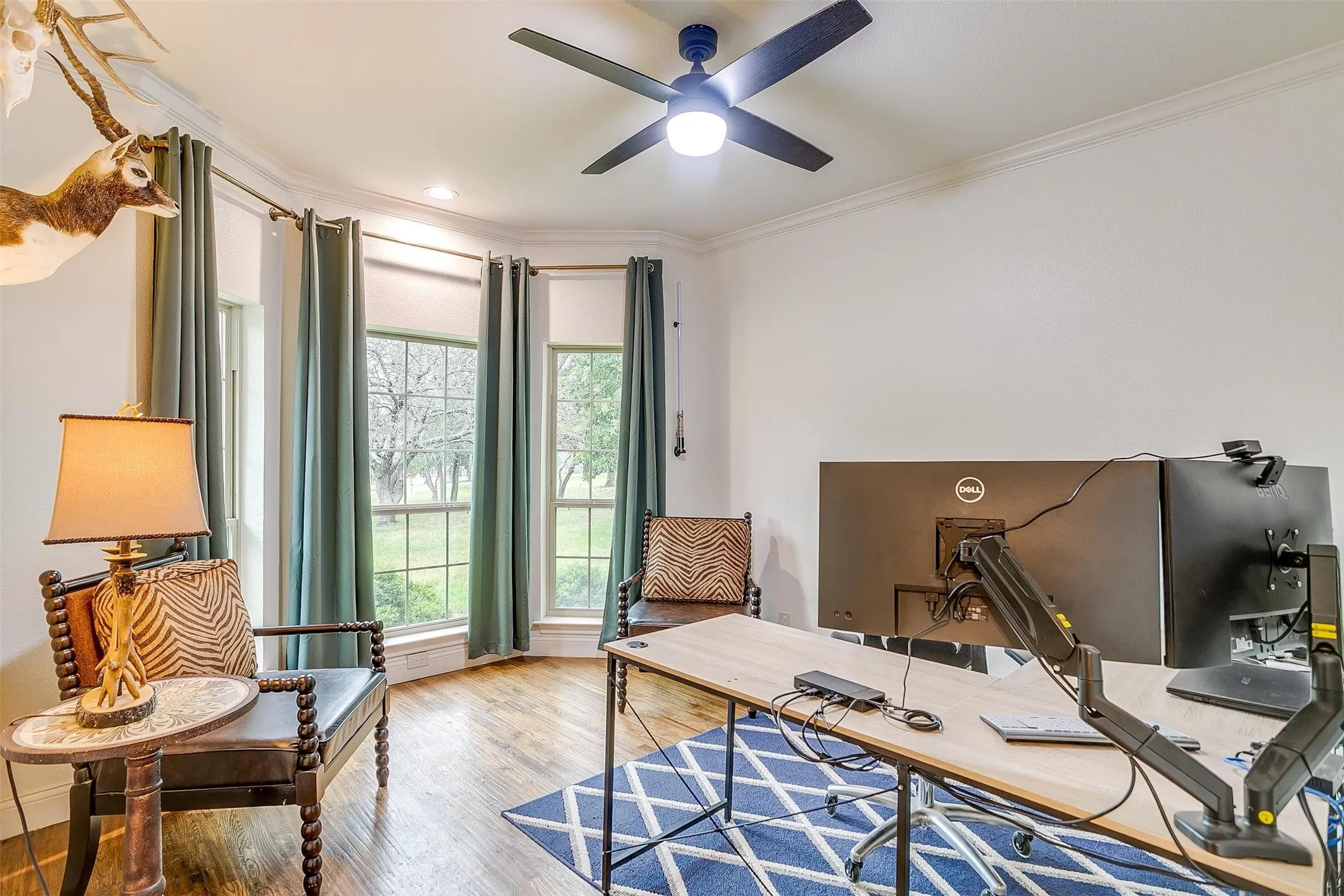 Office space with crown molding, light wood-type flooring, a ceiling fan, and recessed lighting