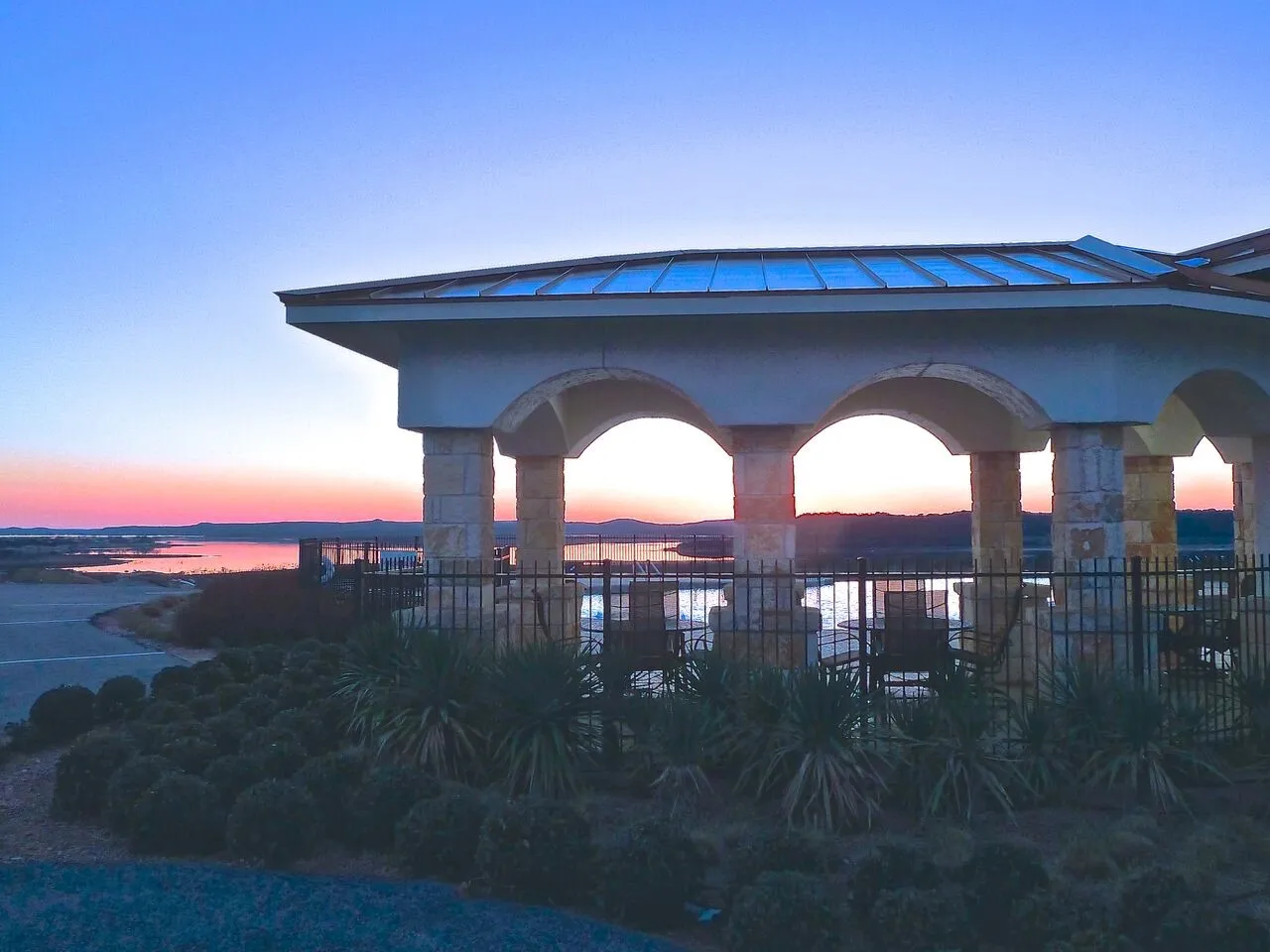 Stunning lake view from the patio of the community swimming pool​​‌​​​​‌​​‌‌​‌‌​​​‌‌​‌​‌​‌​​​‌​​ area.